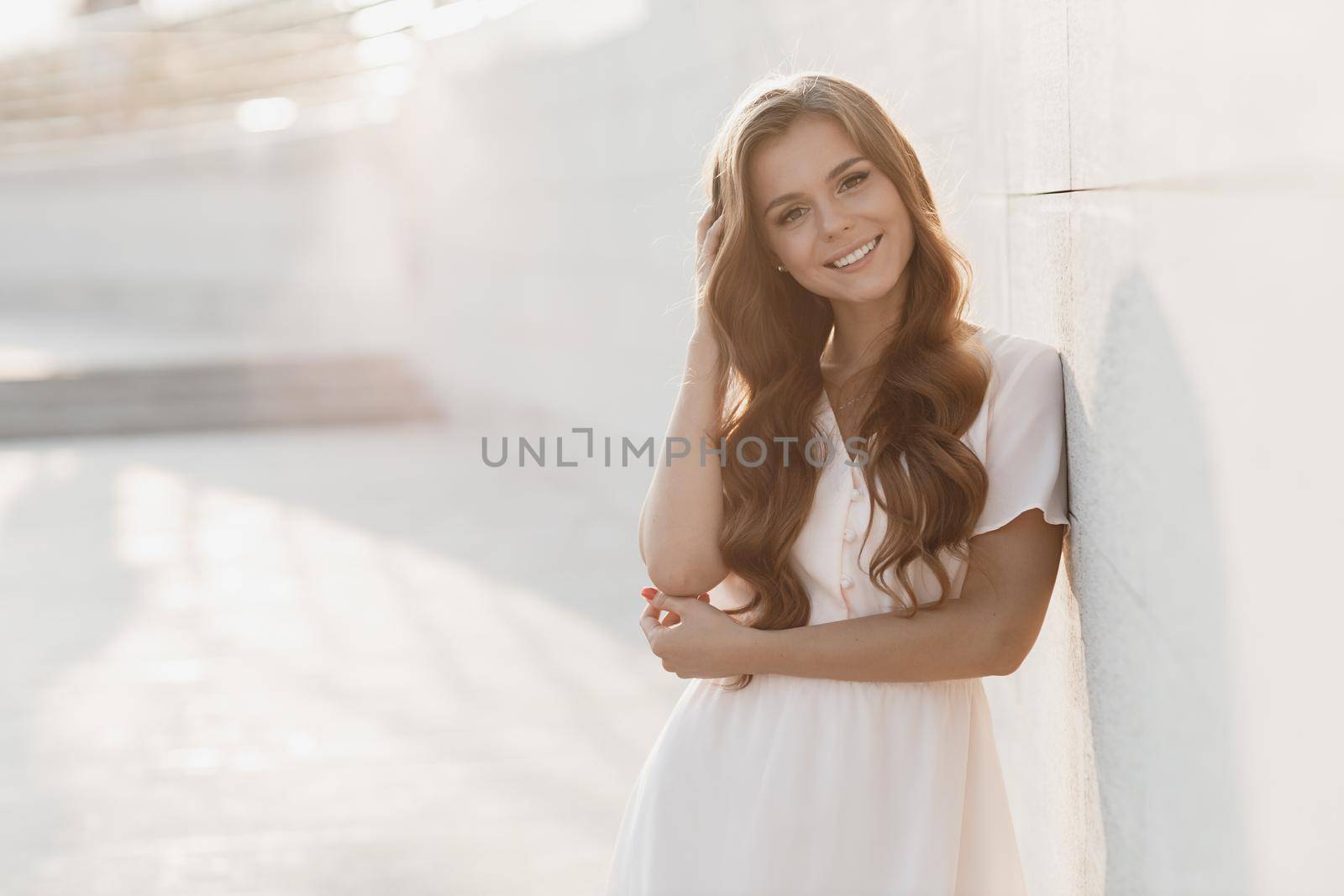 Young happy woman in hat outdoor. High quality photo