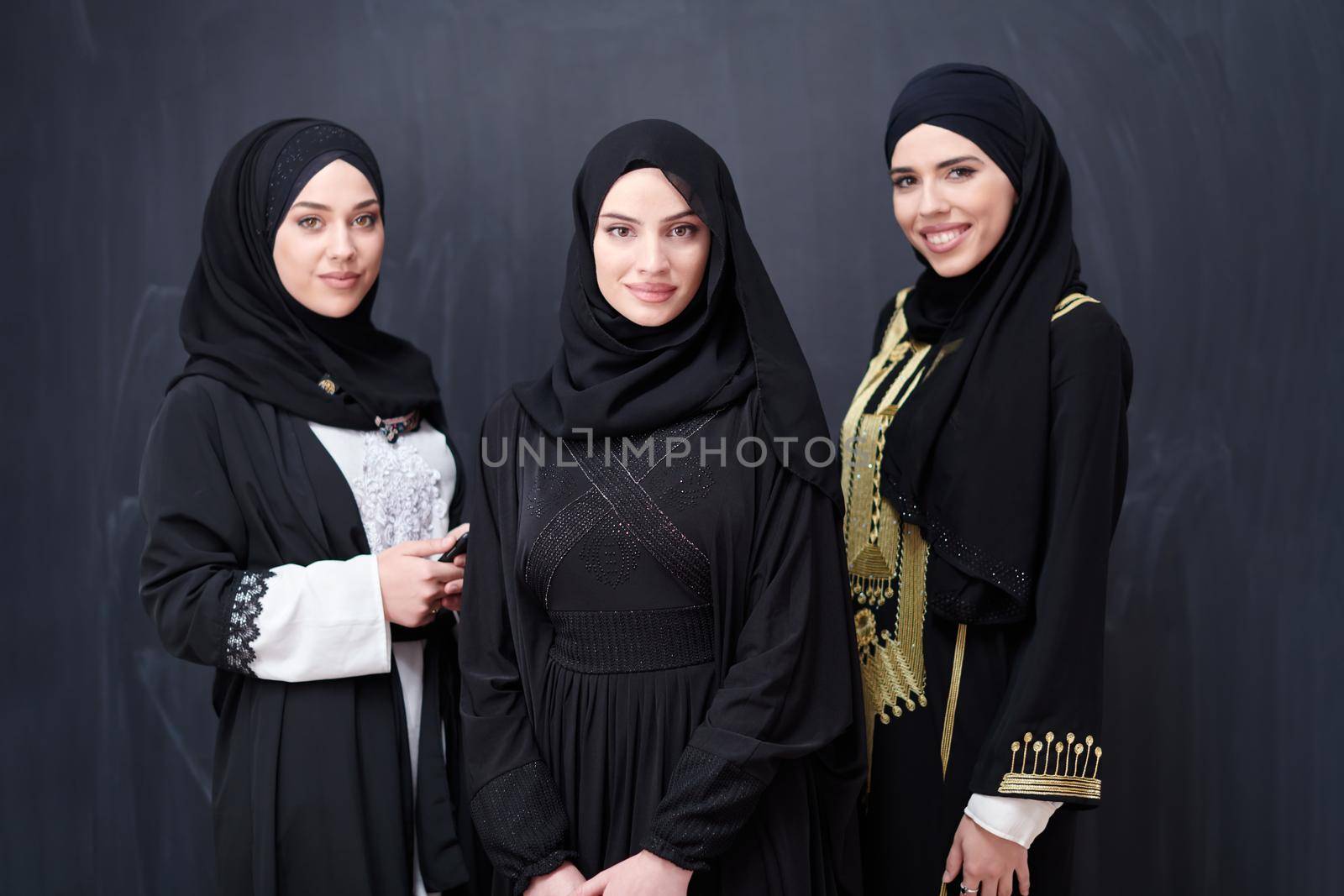 portrait of beautiful muslim women in fashionable dress by dotshock