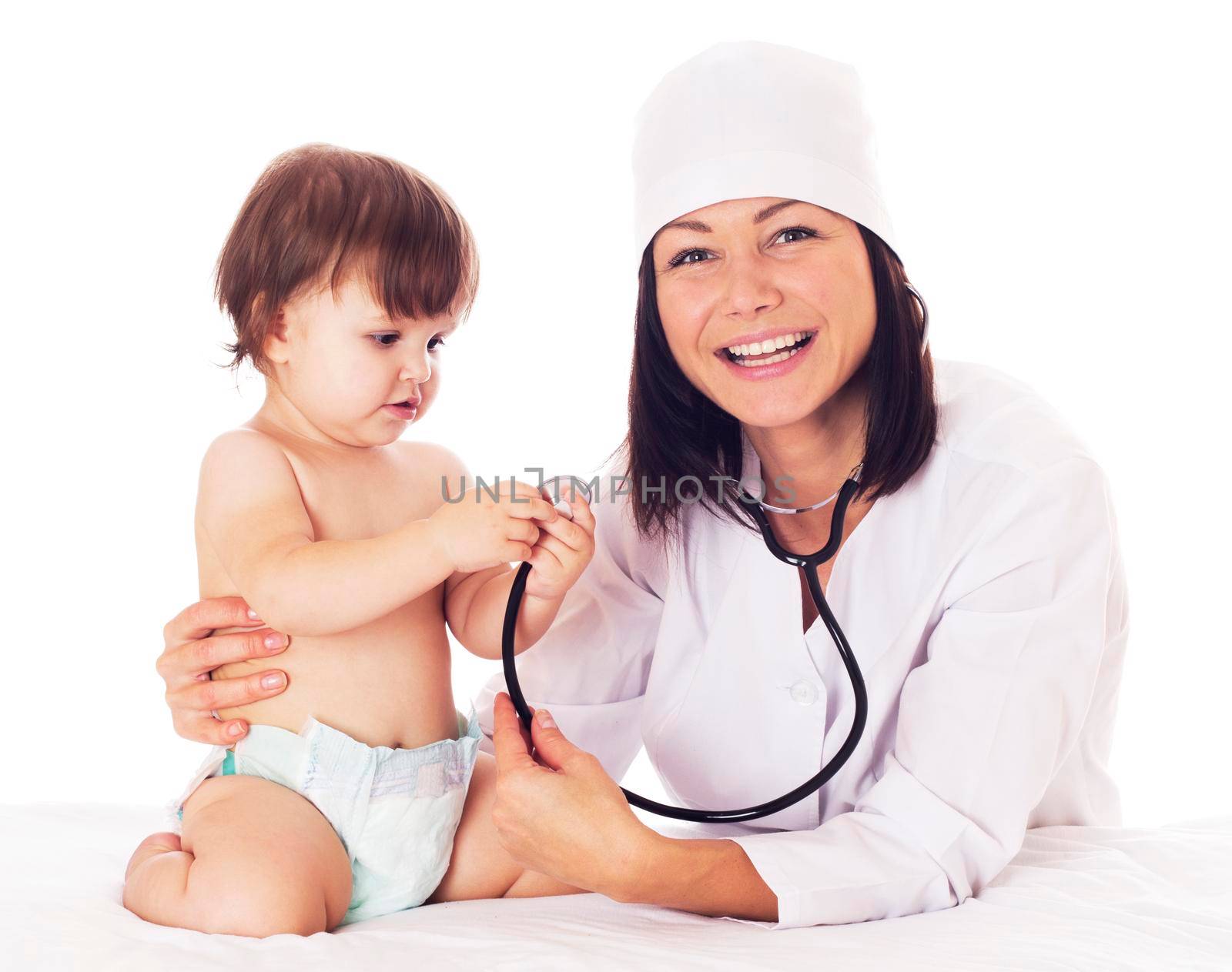 Young female Doctor checking baby with stethoscope on white background