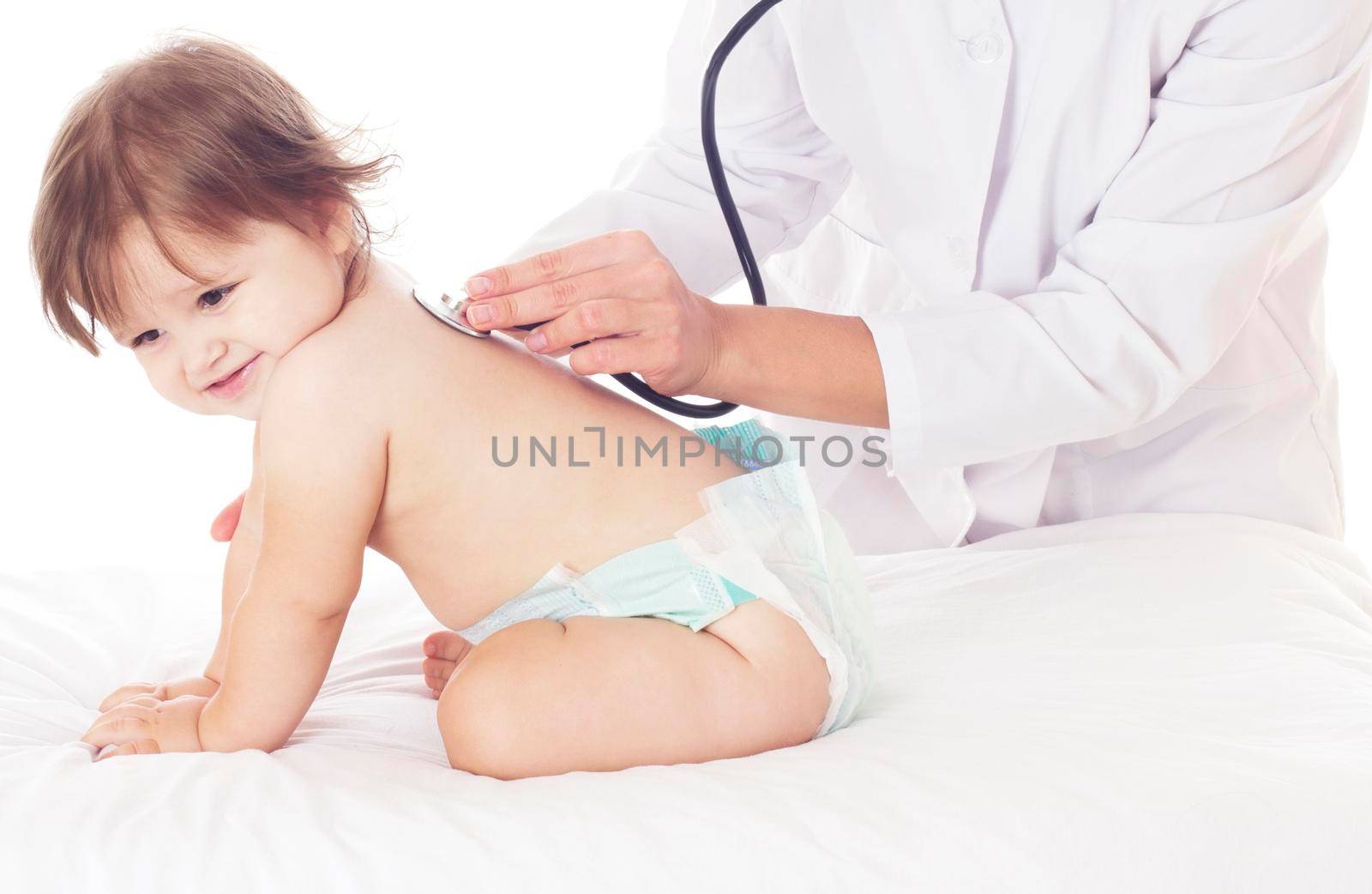 Young female Doctor checking baby with stethoscope on white background.