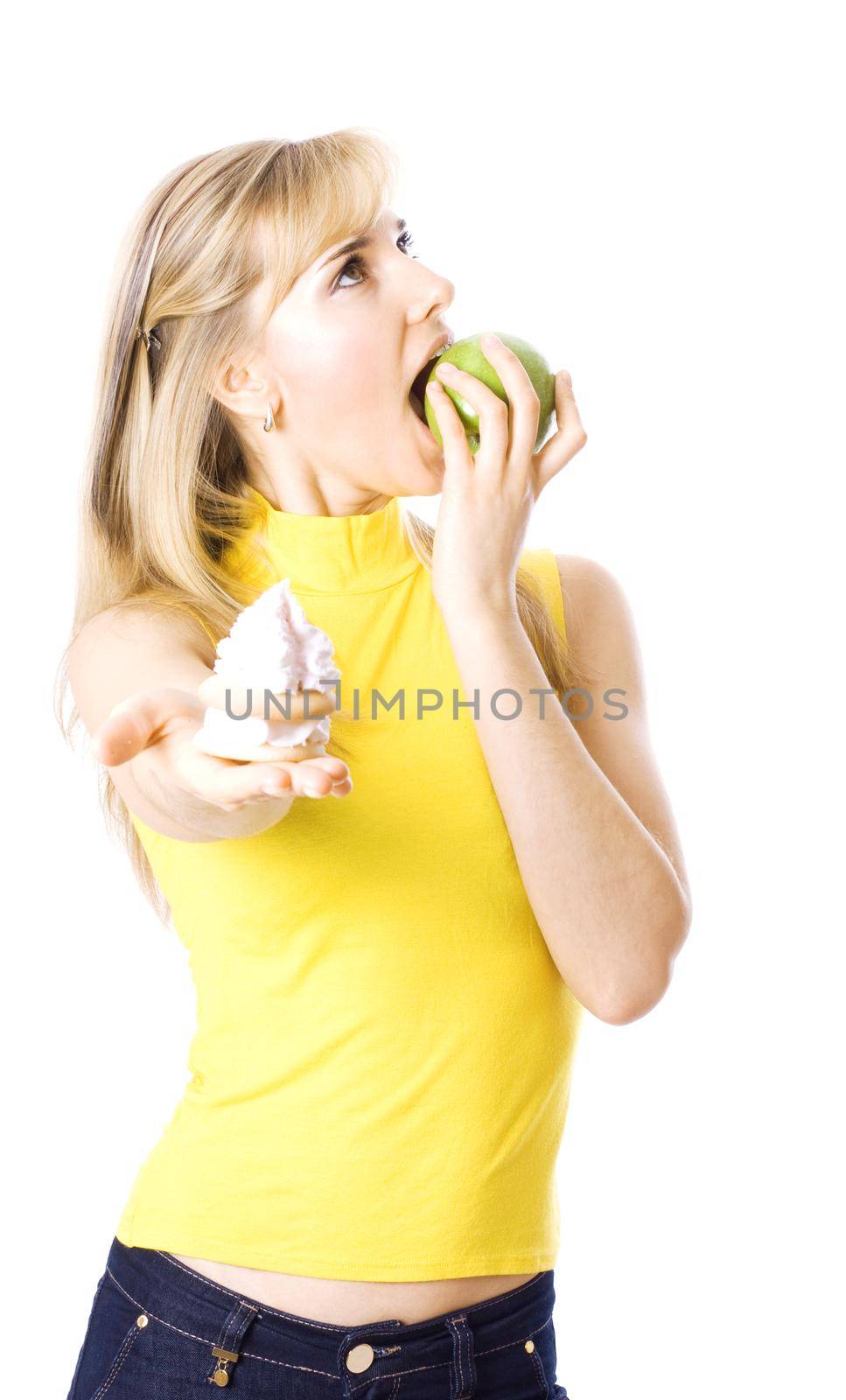Young beautiful girl with fruit and cake in her hands, isolated on white
