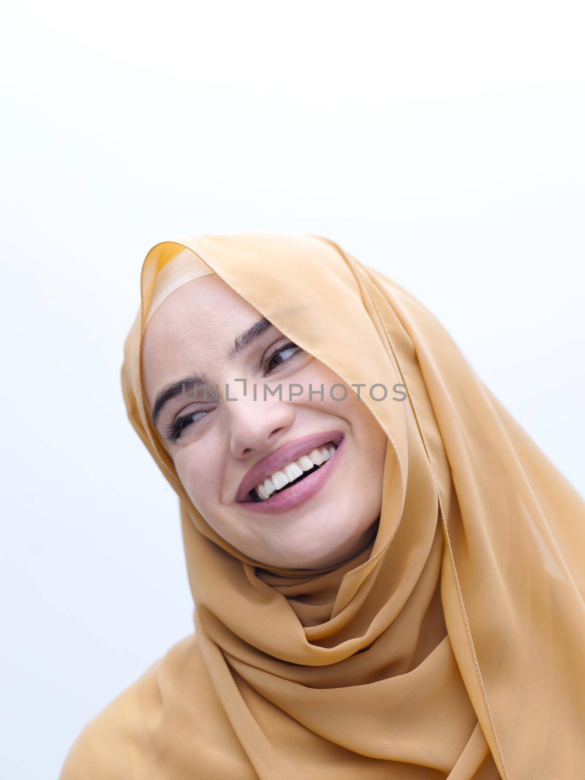 portrait of beautiful muslim woman in fashionable dress with hijab isolated on white background representing modern islam fashion and ramadan kareem concept