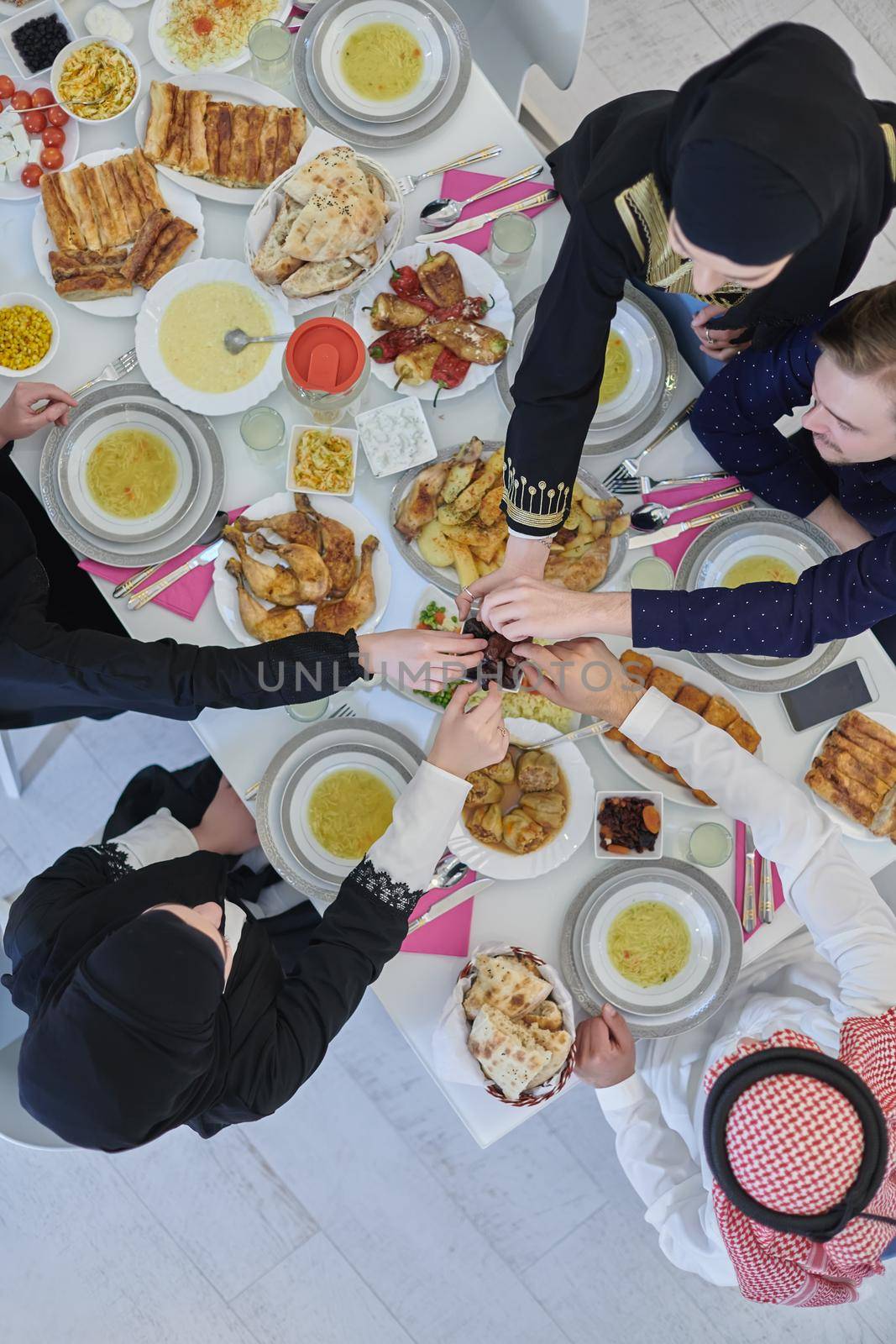 Top view of muslim family having Iftar during Ramadan holy month by dotshock