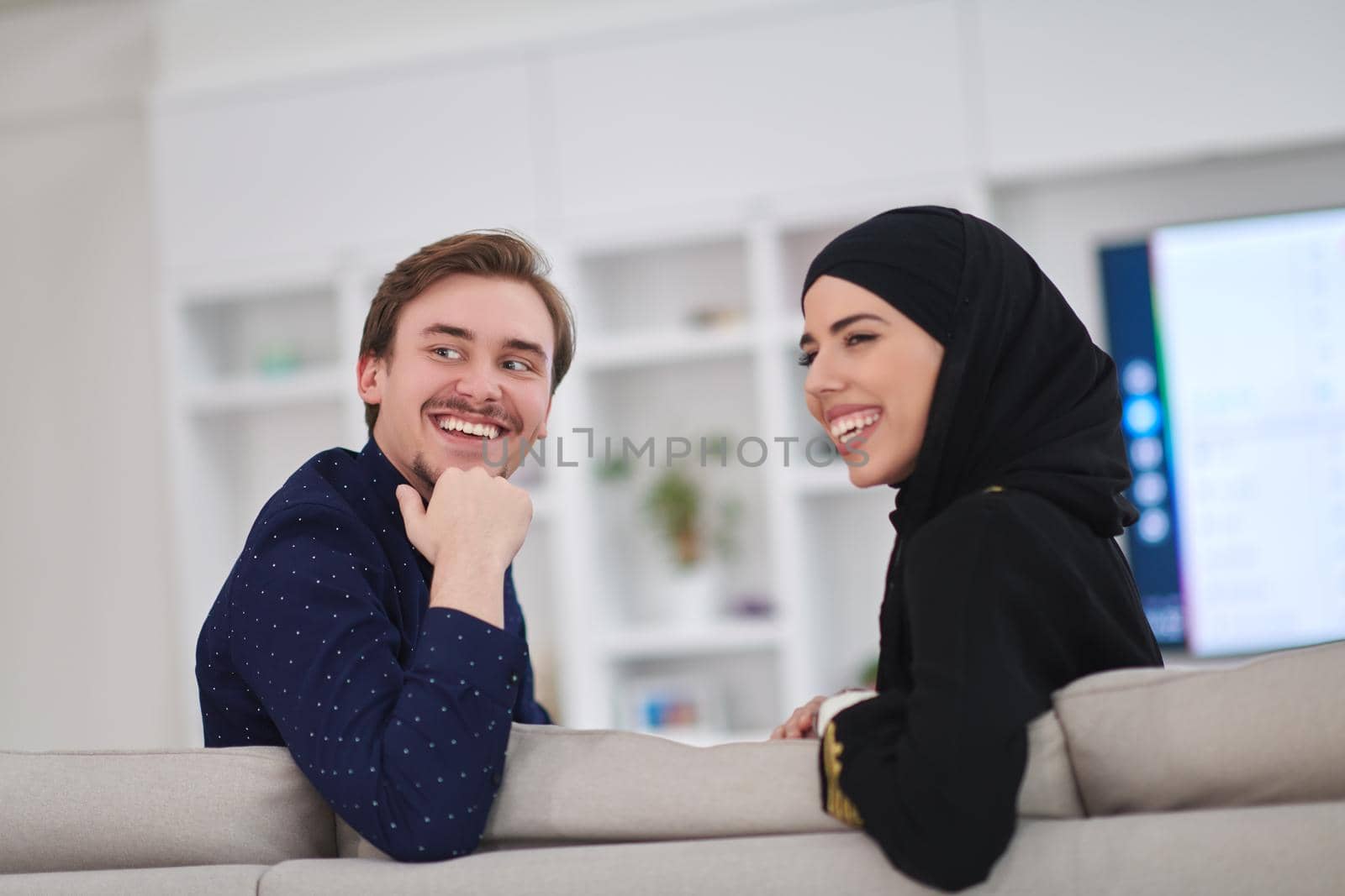 Young muslim couple enjoing time together at home during Ramadan by dotshock