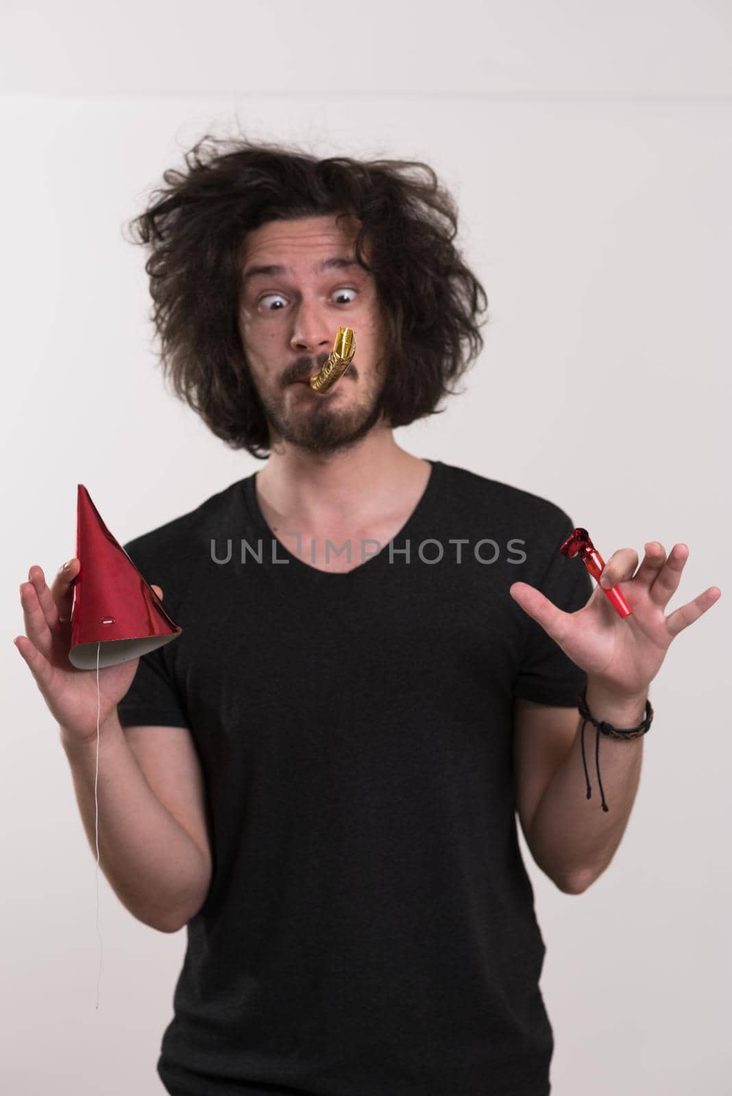 young man on party celebrating new year and dancing