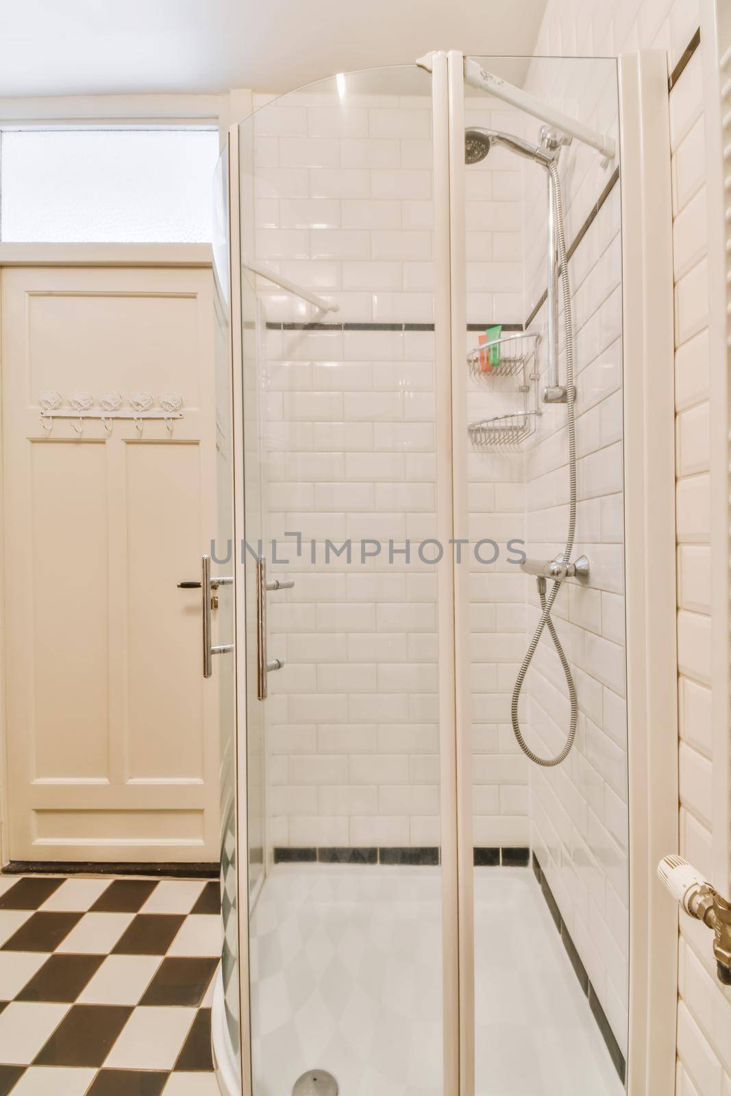 Delightful bathroom with white and black checkerboard floor