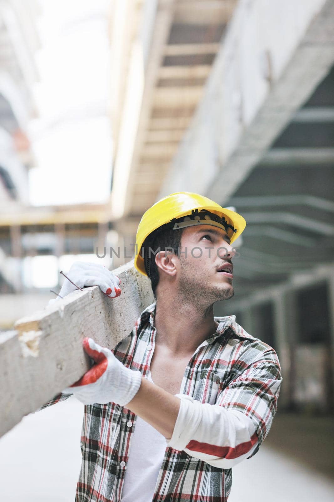hard worker on construction site by dotshock