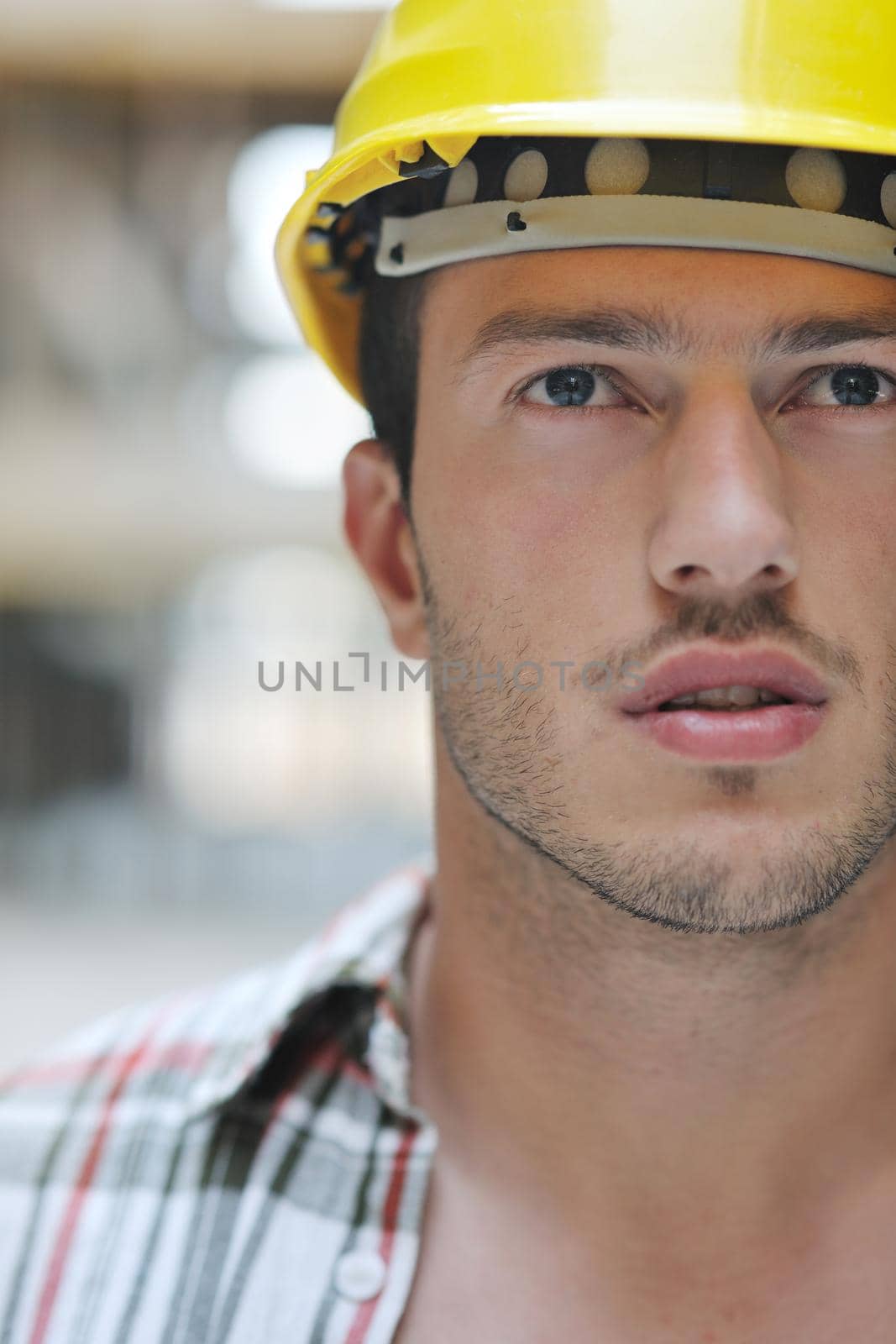 handsome hard worker people portrait at concstruction site