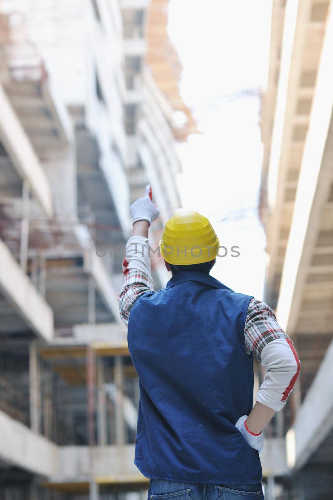 hard worker on construction site by dotshock