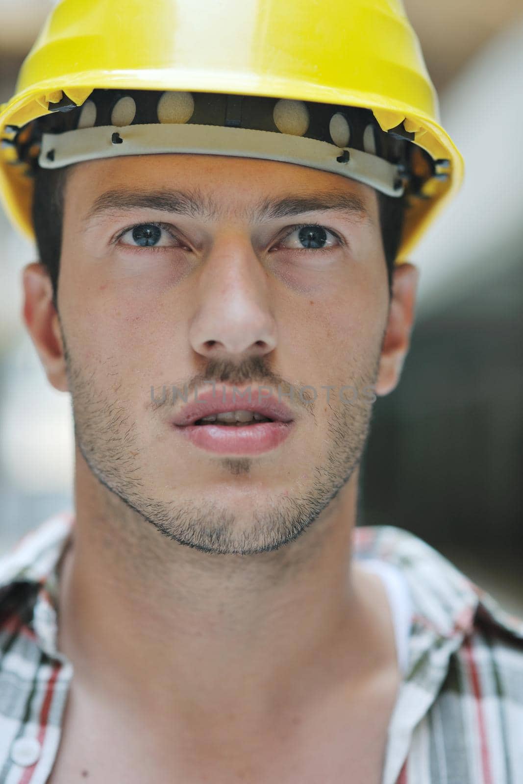 handsome hard worker people portrait at concstruction site