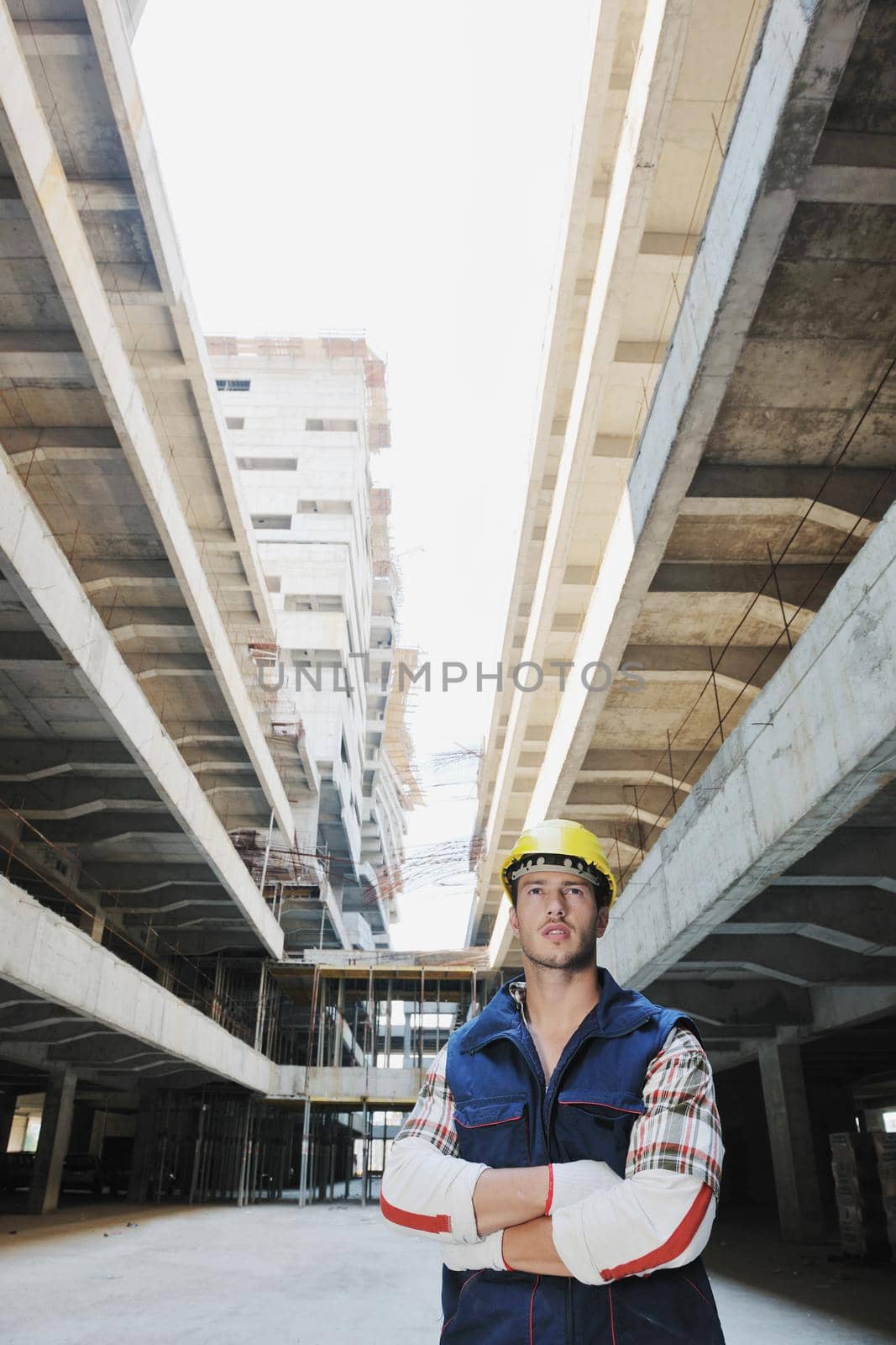 handsome hard worker people portrait at concstruction site