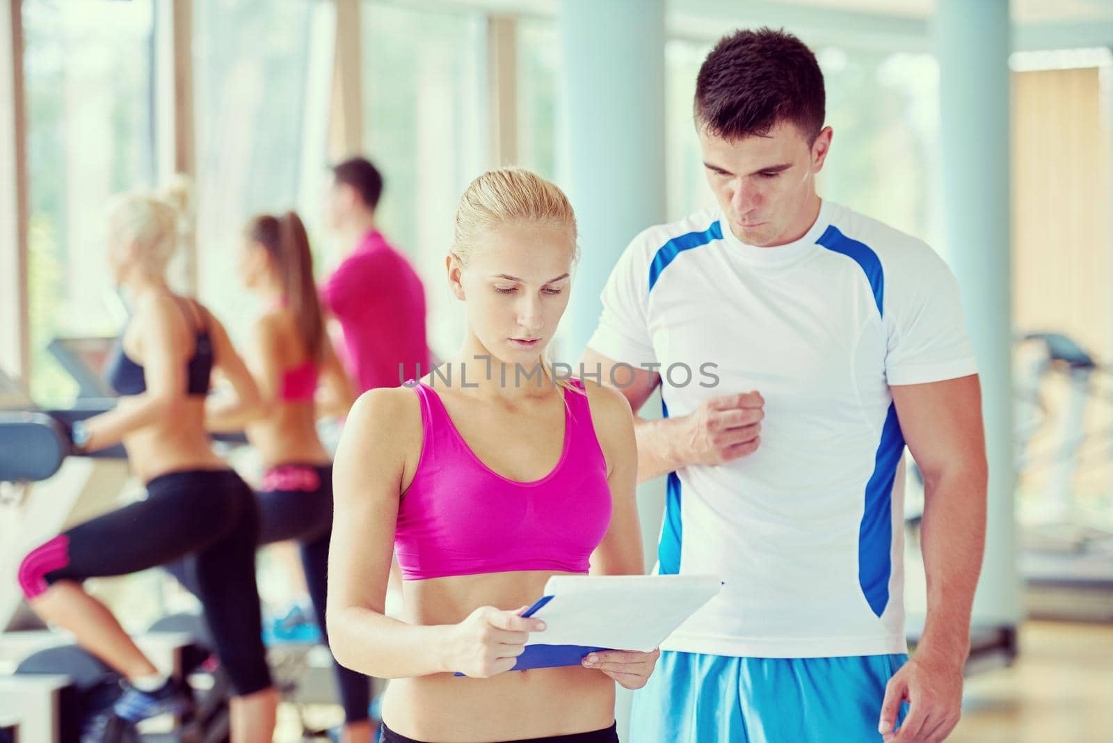 people group in fitness gym by dotshock