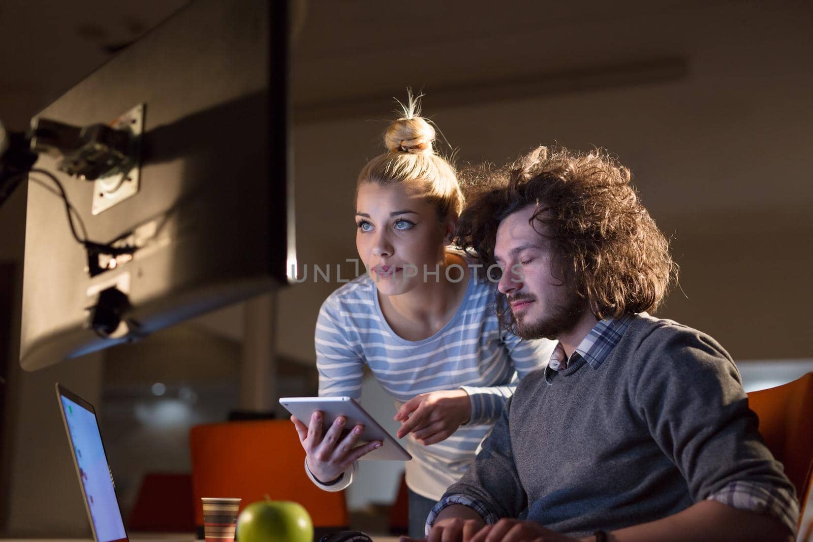 young designers in the night office by dotshock