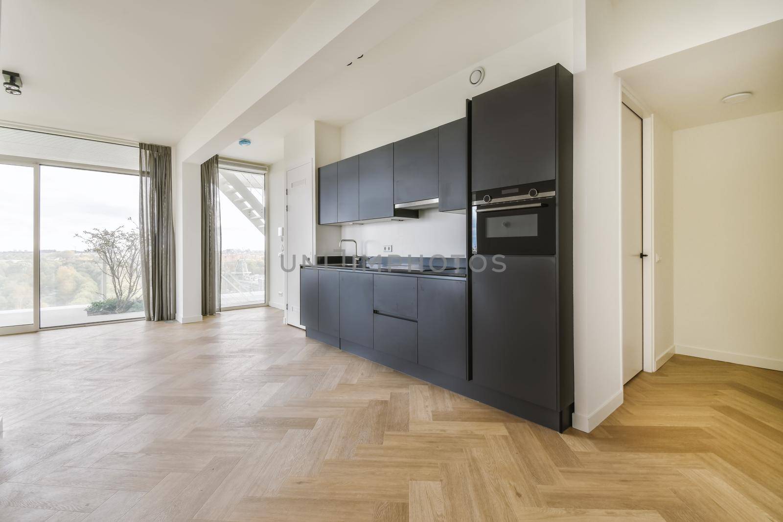 Amazing kitchen with black kitchen unit and stove