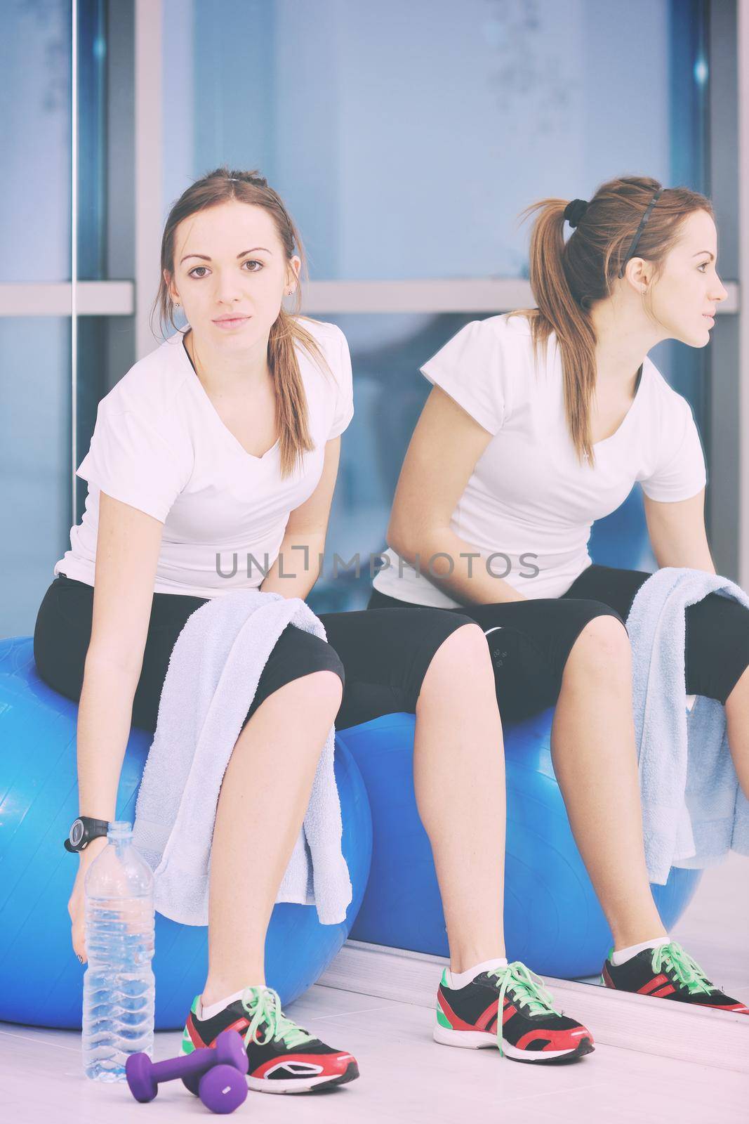 young woman drink water at fitness workout training at sport club