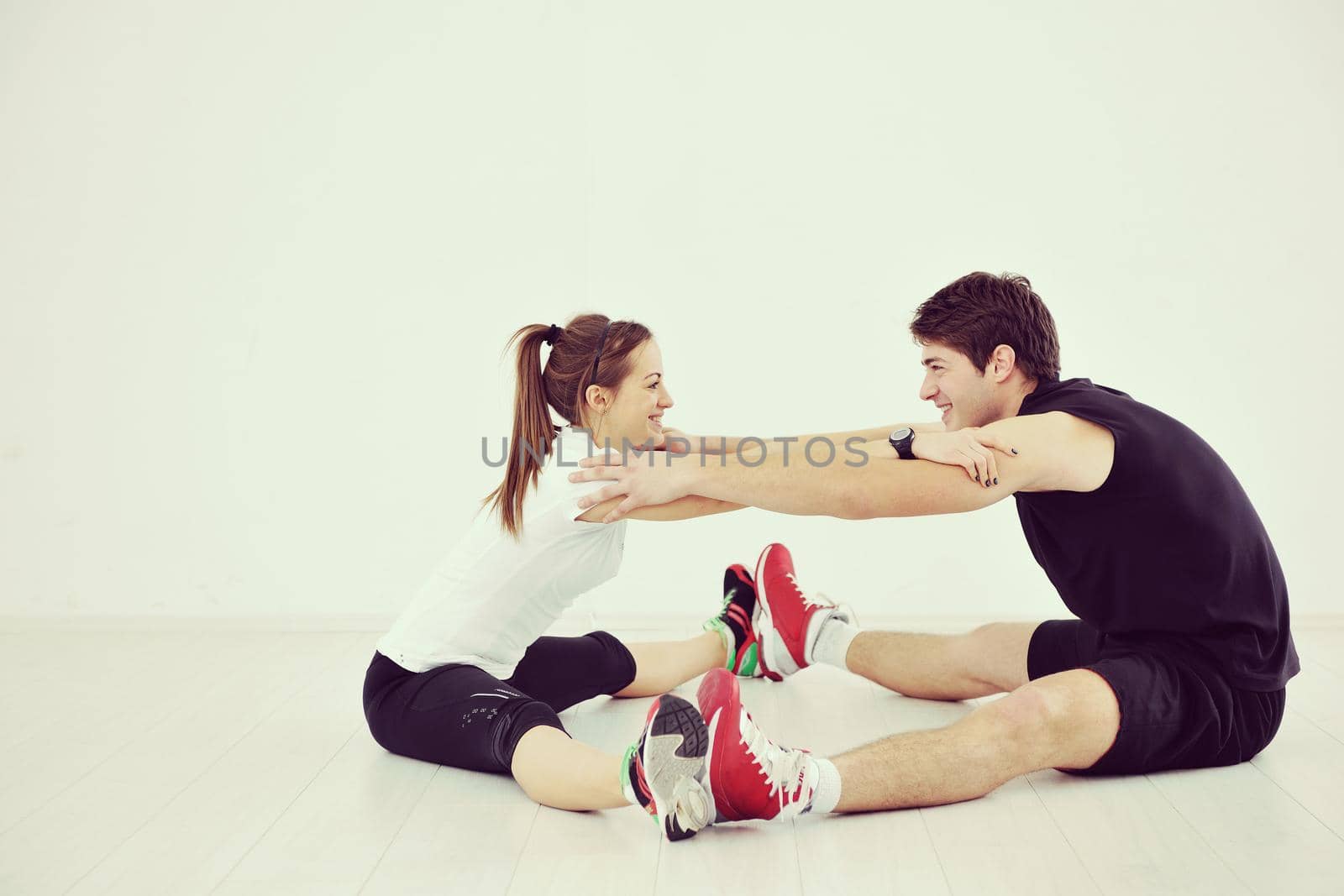 young people group in fitness club by dotshock