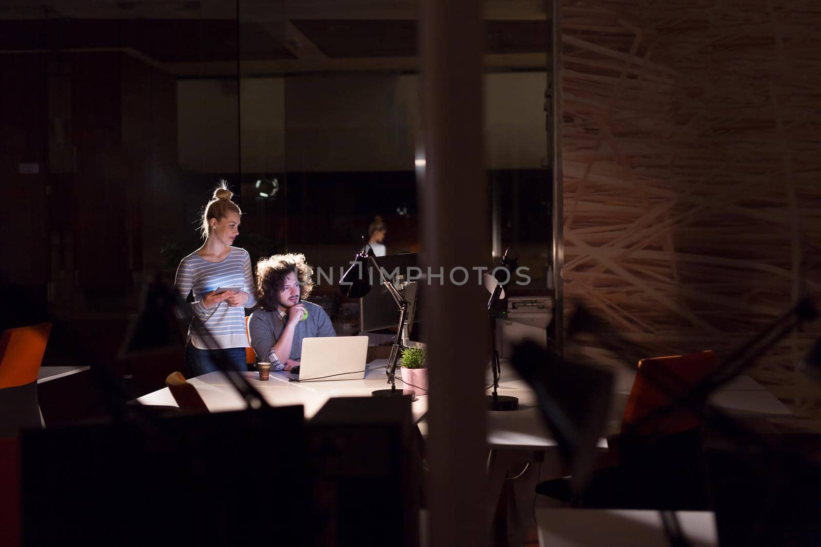 young designers in the night office by dotshock