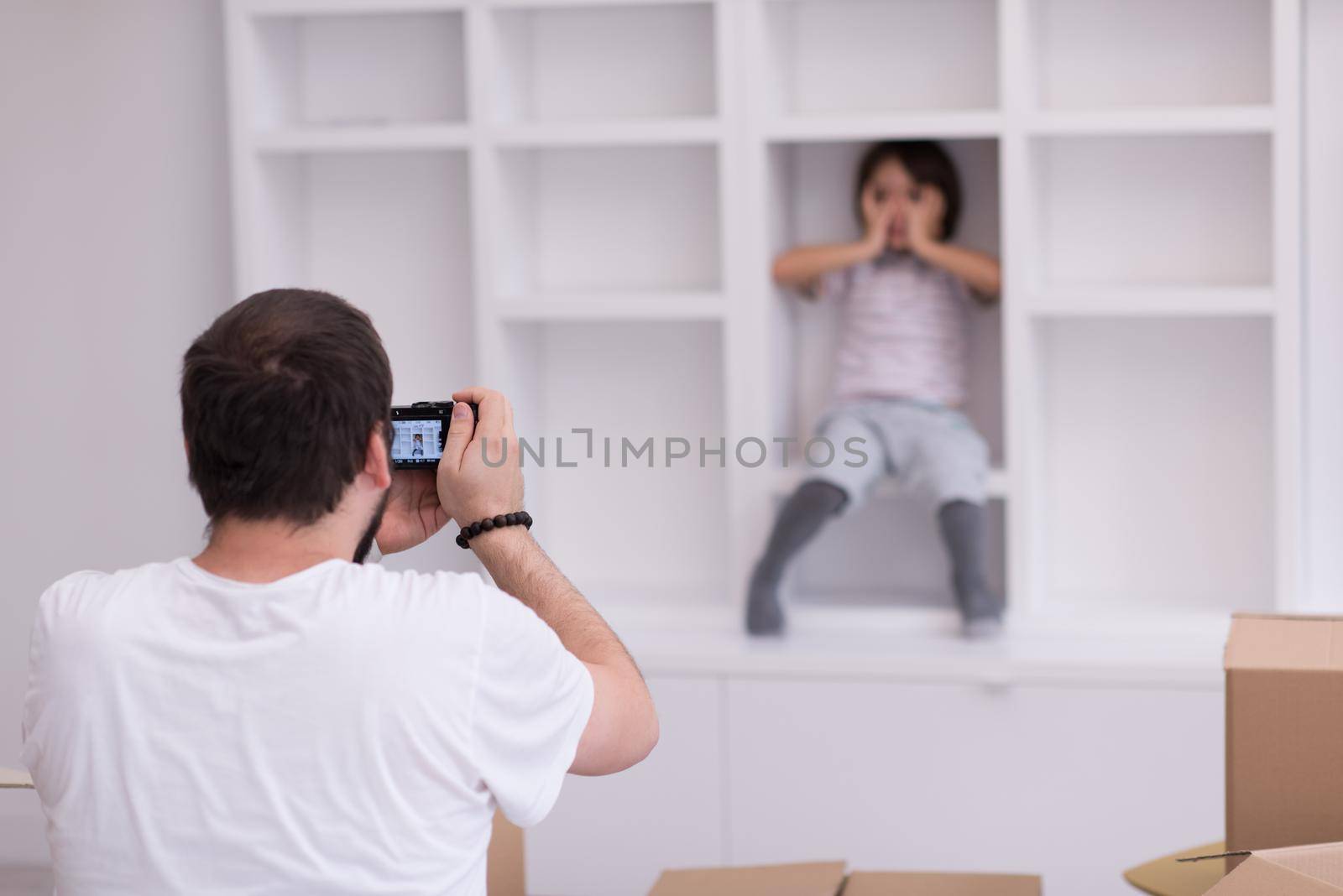 Photoshooting with kid model at studio as new modern home