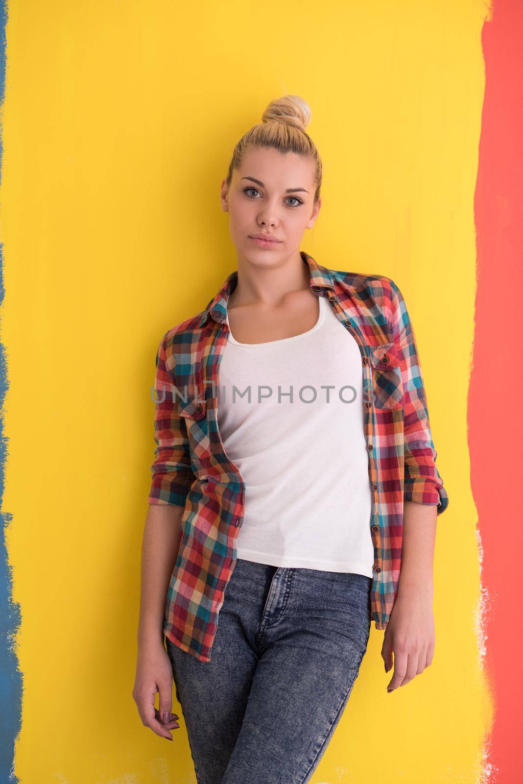 young woman over color background by dotshock