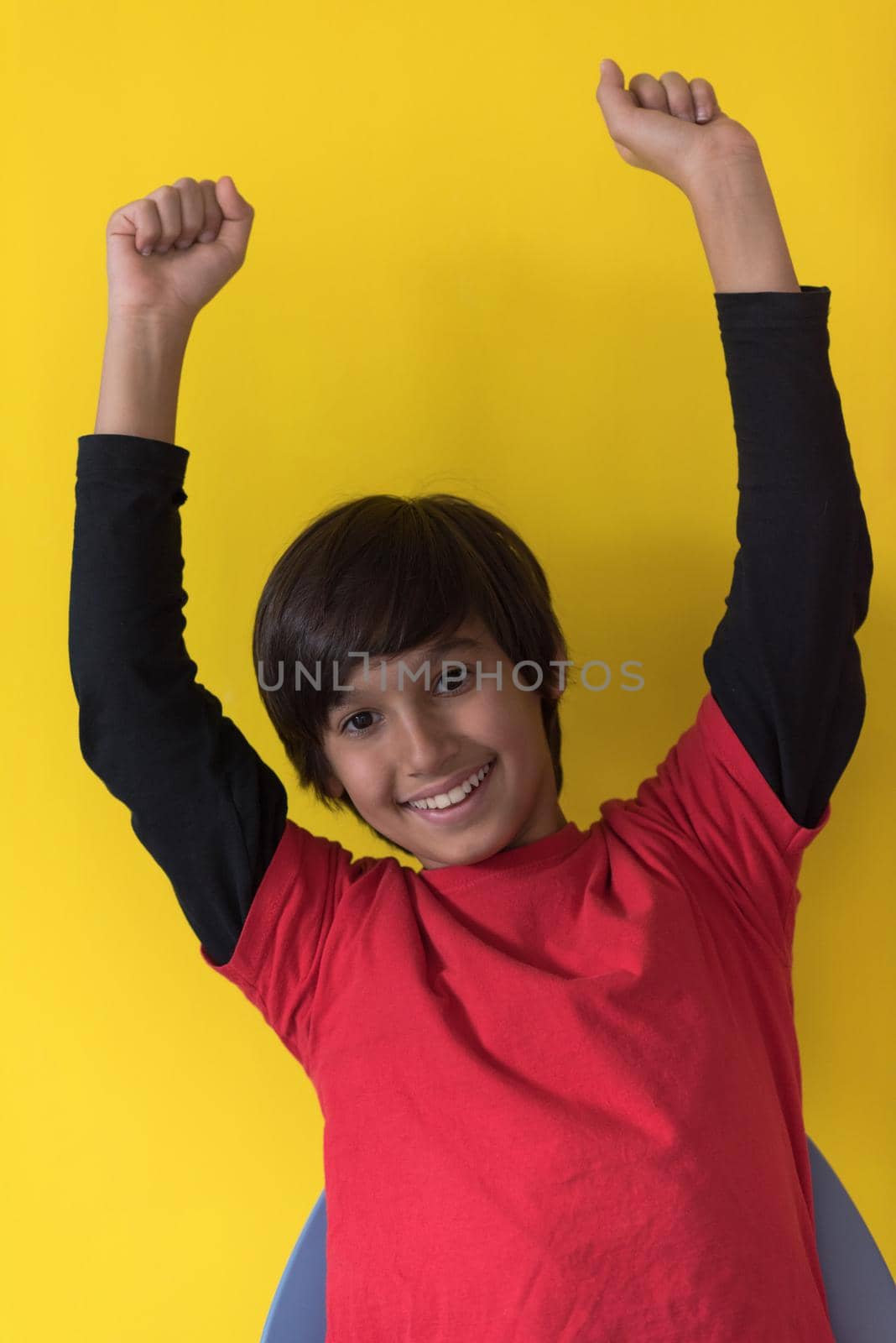 Portrait of a happy young boy by dotshock