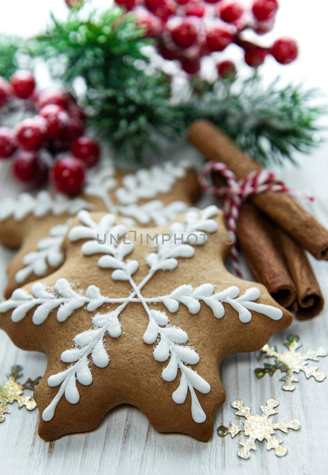 Christmas gingerbread with christmas decorations on white wooden table. Christmas holiday background