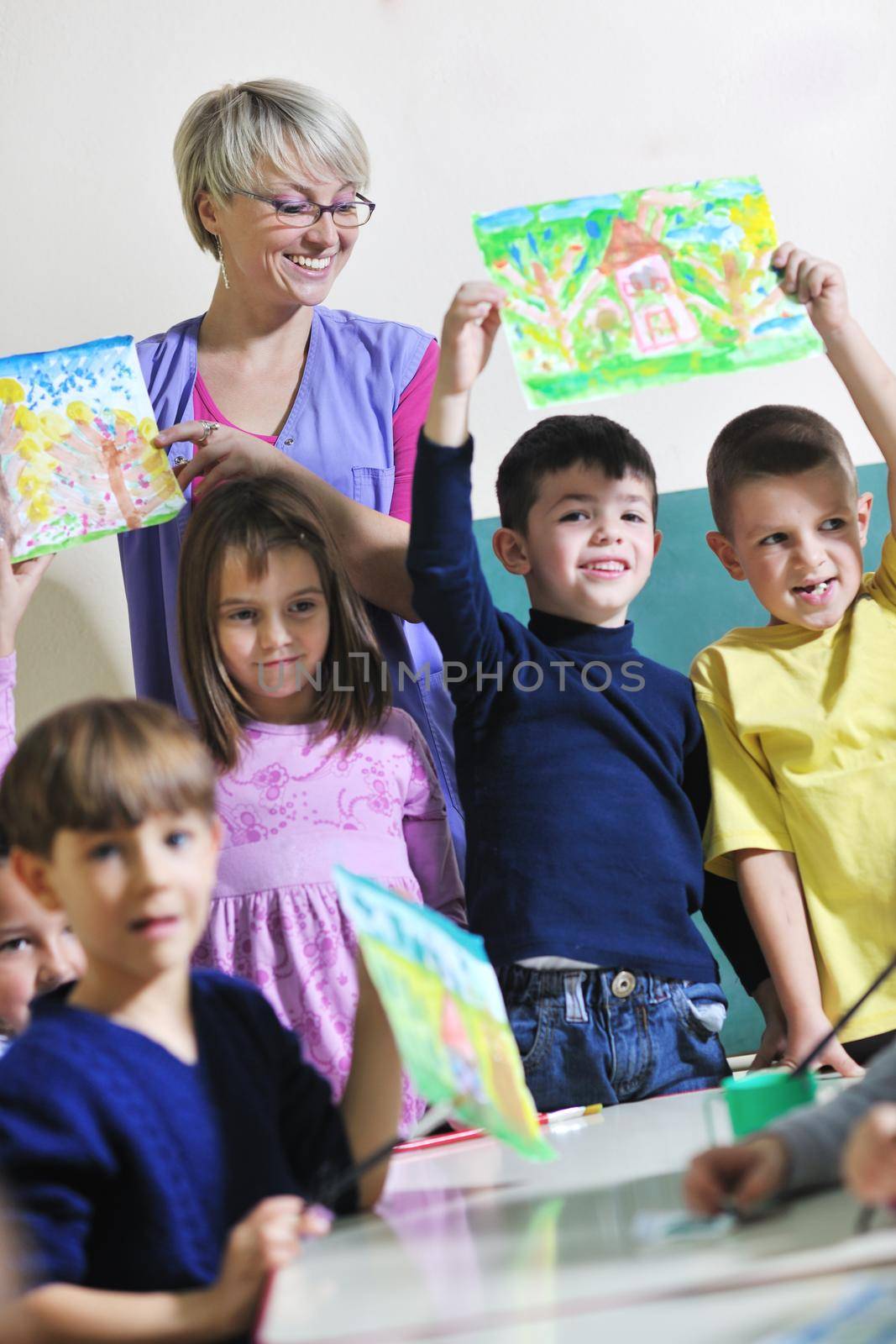 happy child kids group have fun and play at kindergarden indoor preschool education concept with  teacher