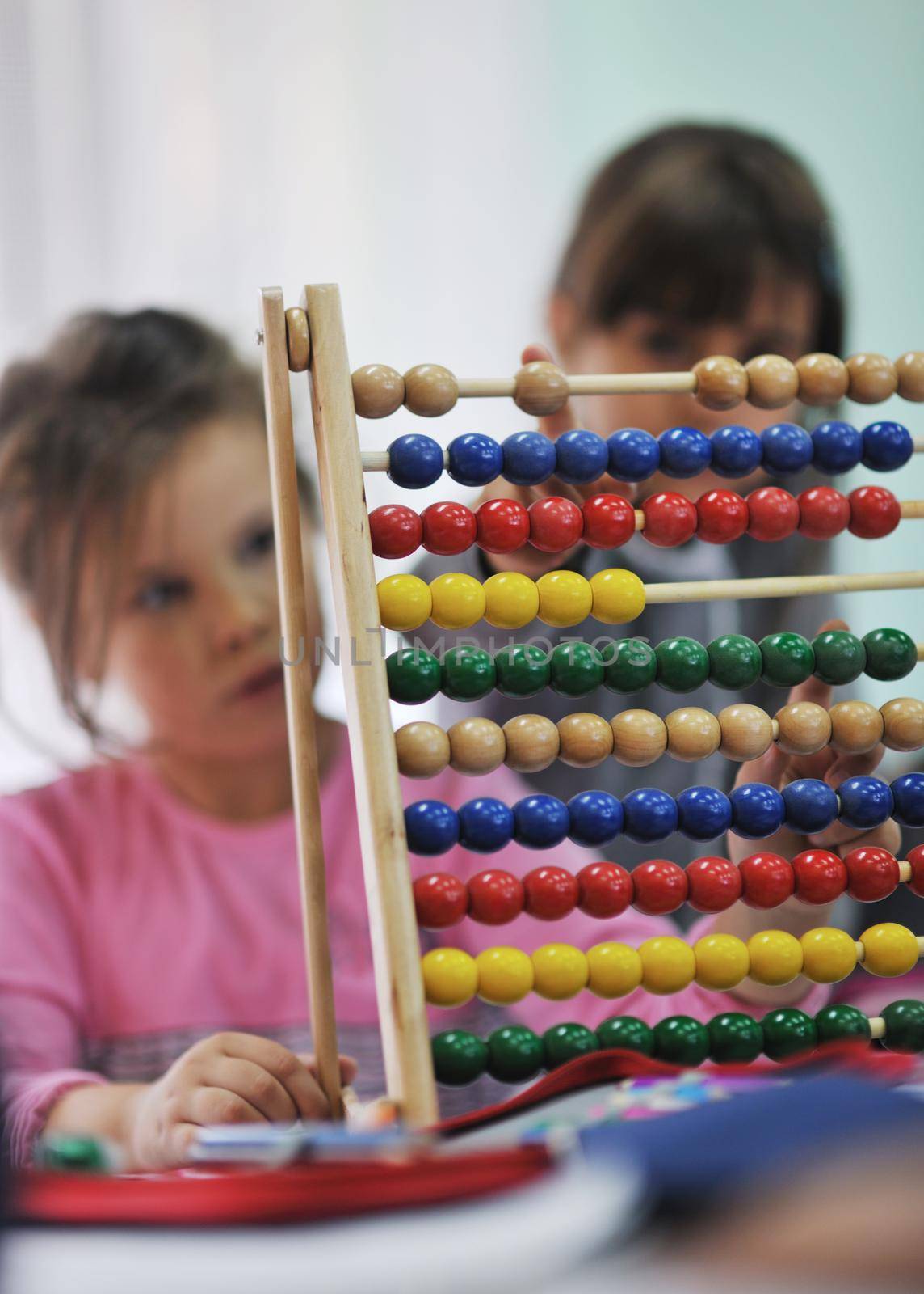 happy child kids group have fun and play at kindergarden indoor preschool education concept with  teacher