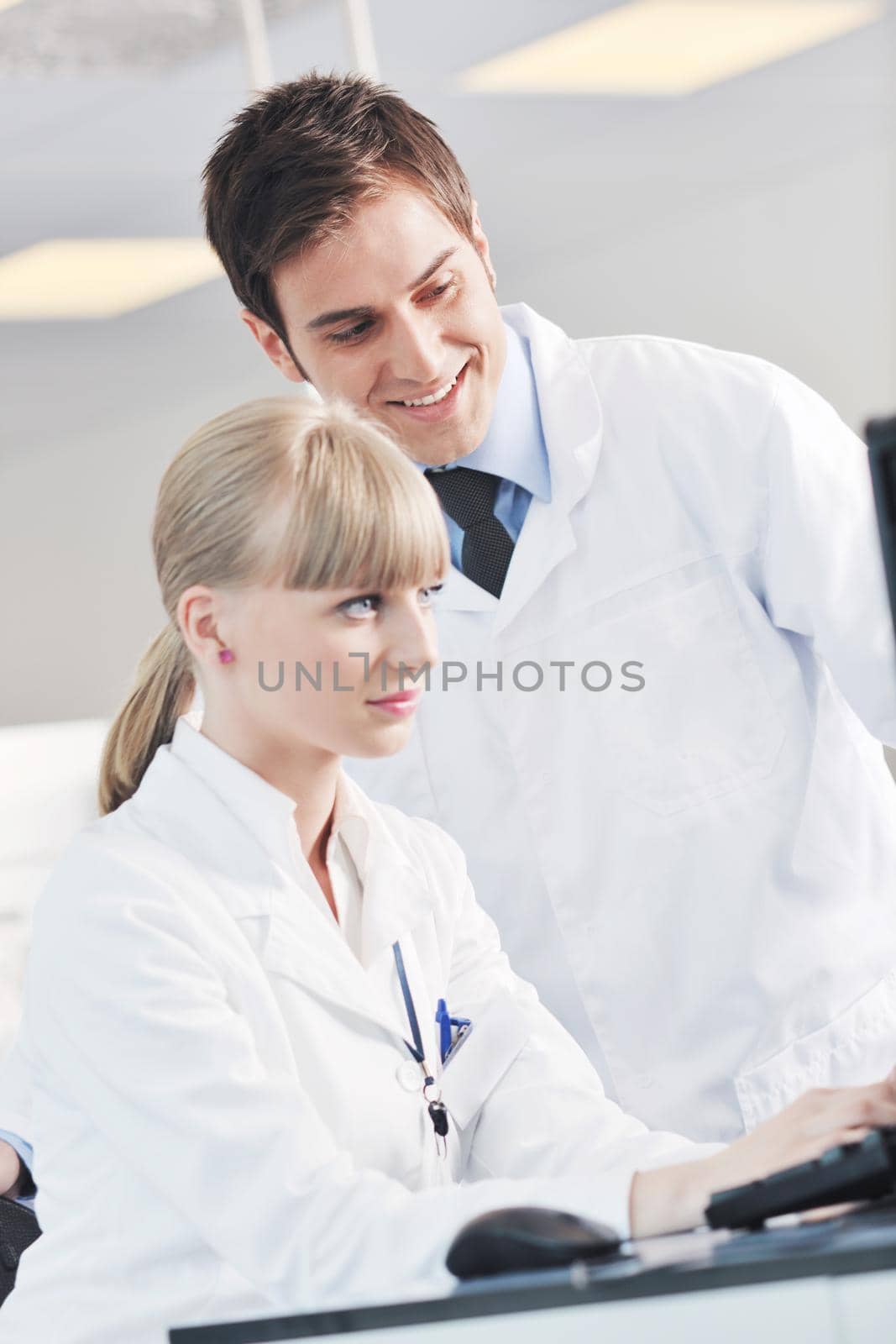 science and research biology chemistry an dmedicine  youn people couple in bright modern  lab