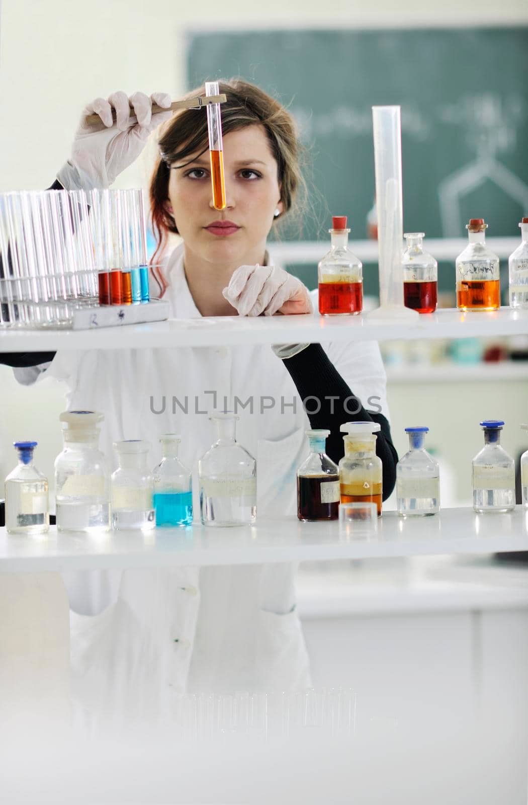 young woman in lab by dotshock