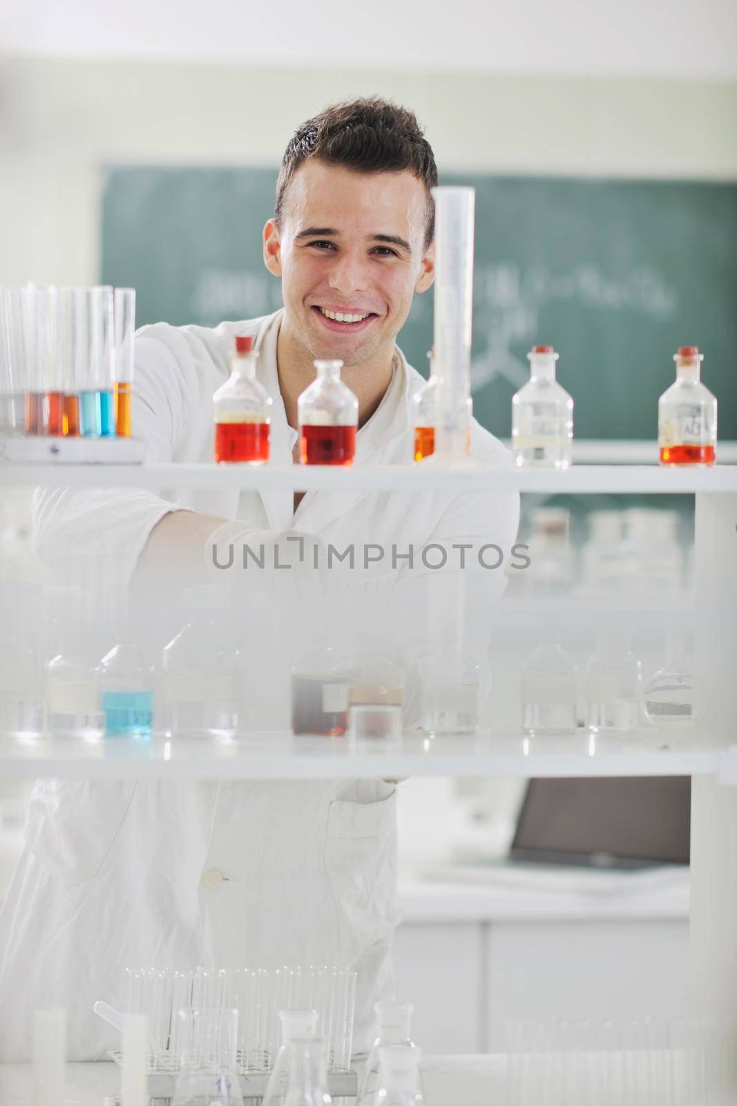 young scientist in lab by dotshock