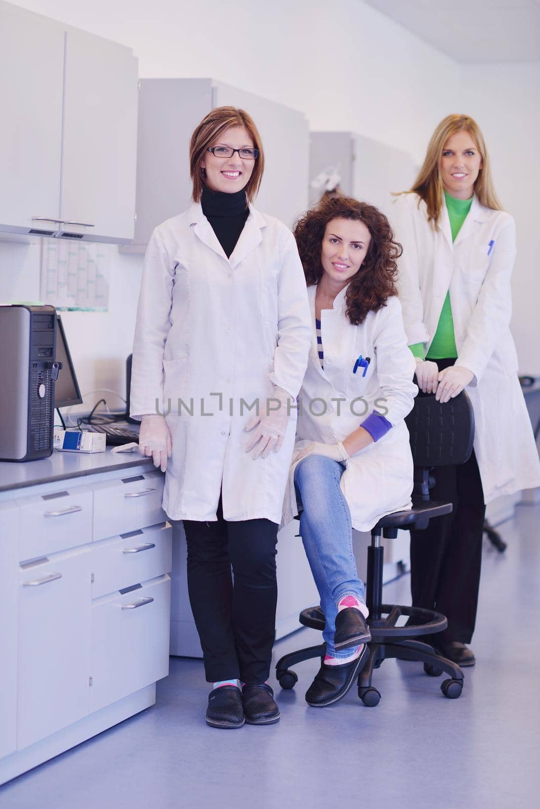 group of scientists working at the laboratory