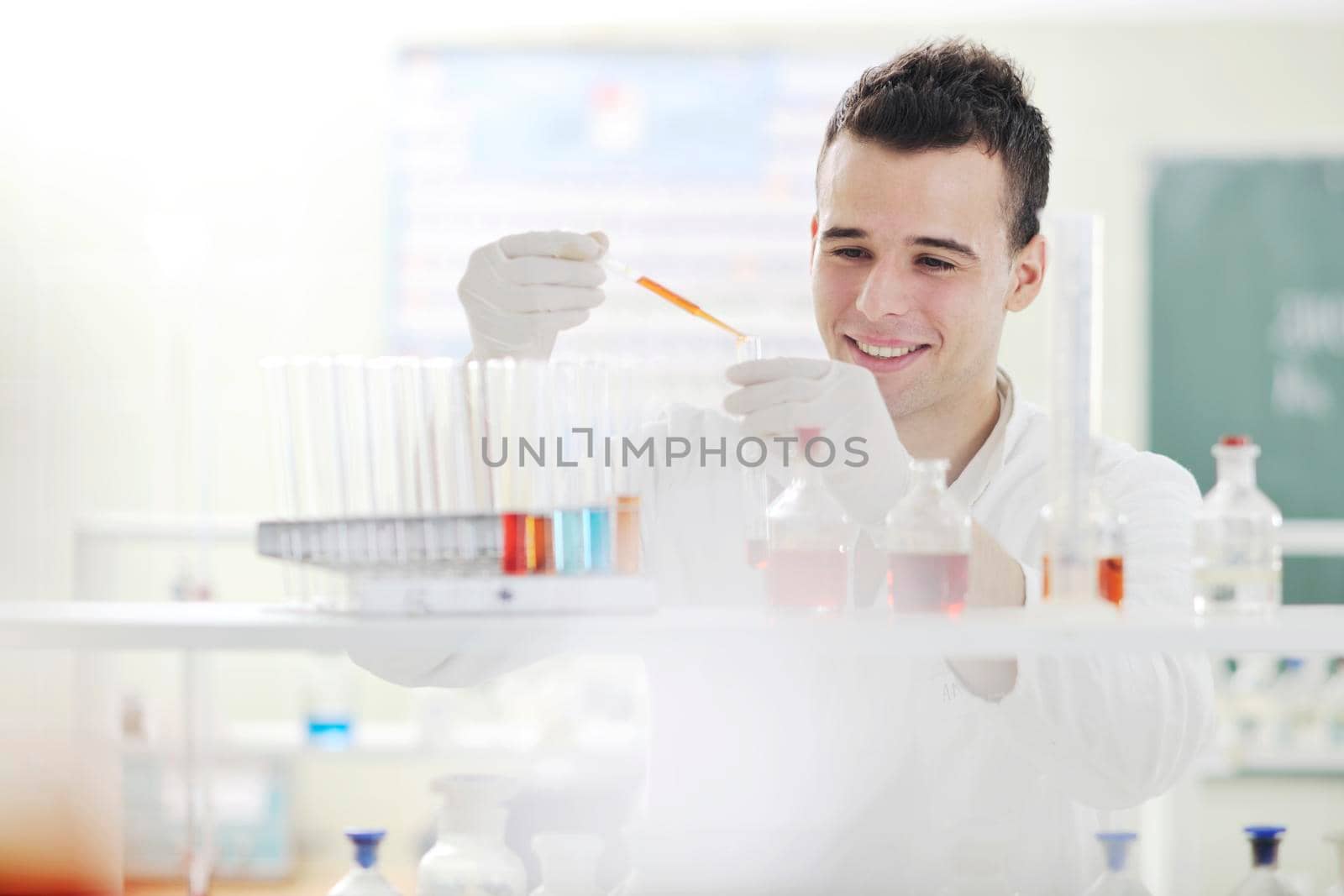 young scientist in lab by dotshock