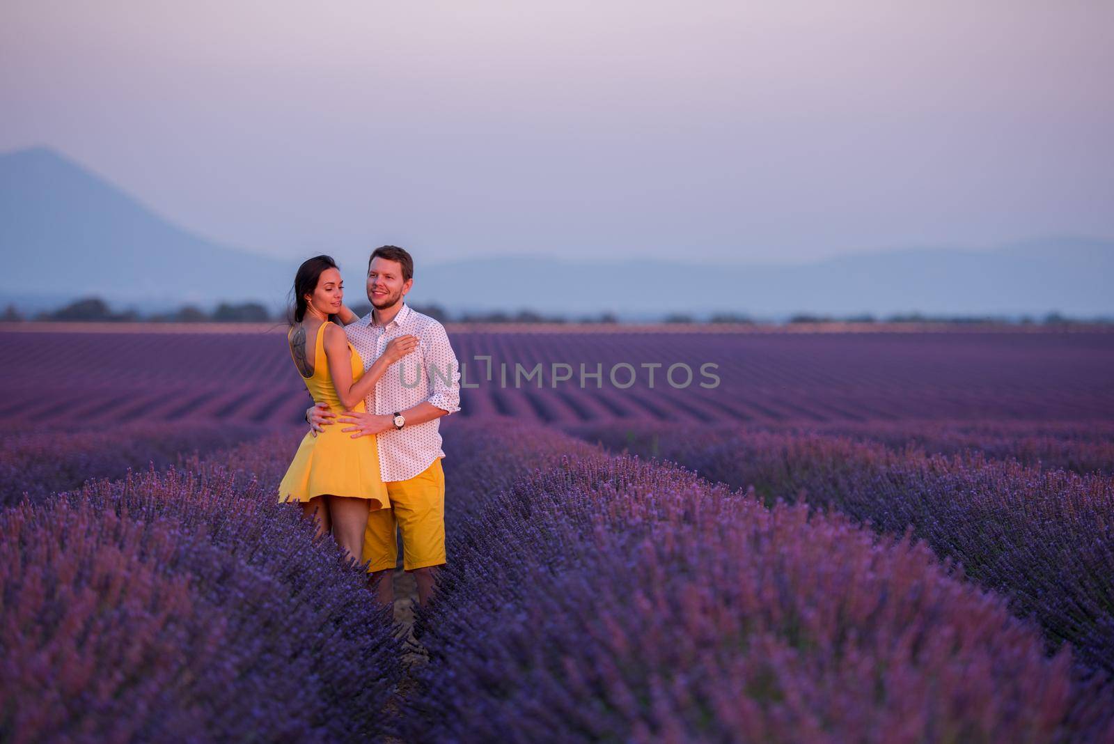 couple in lavender field by dotshock