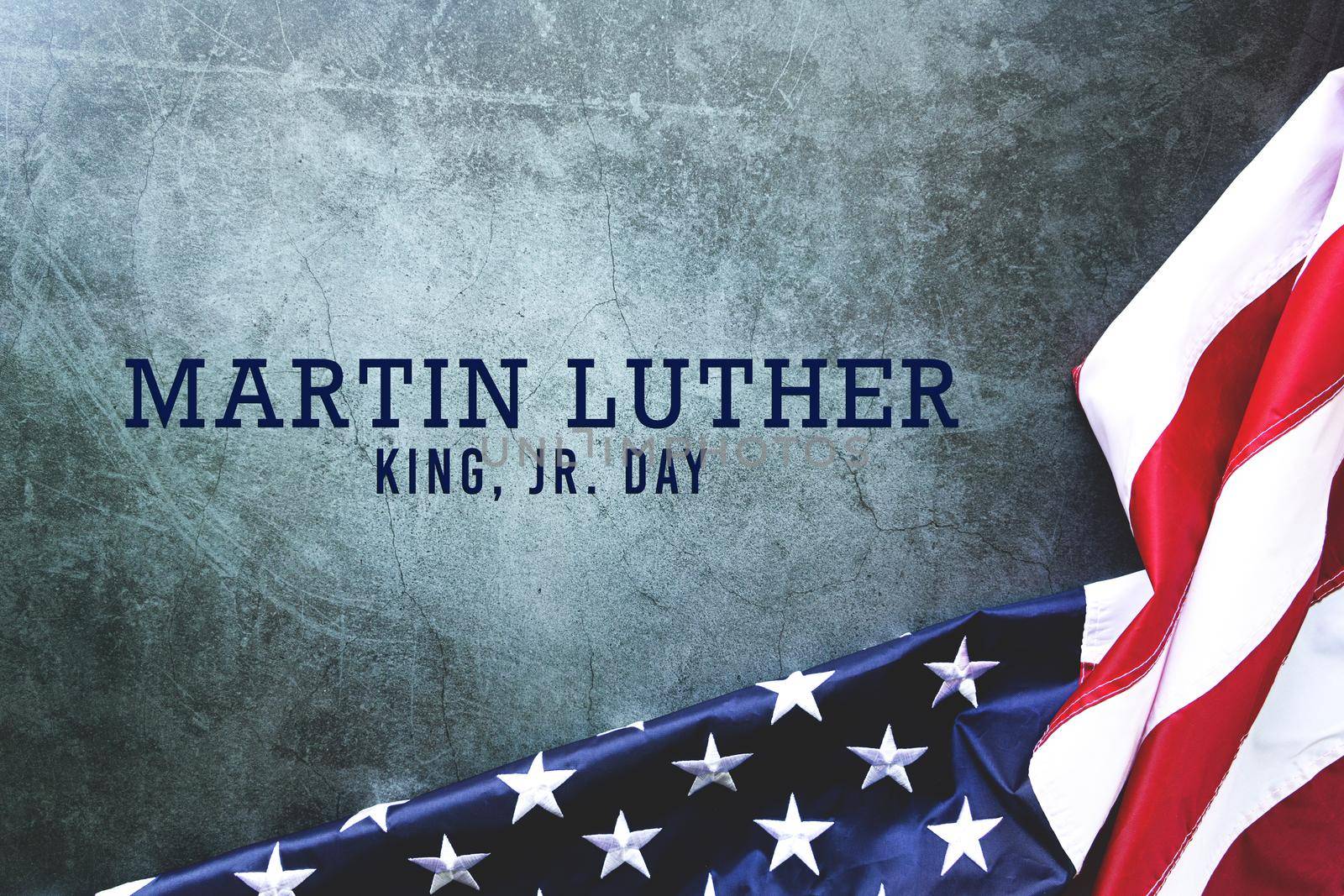 Martin Luther King Day Anniversary - American flag on abstract background by psodaz