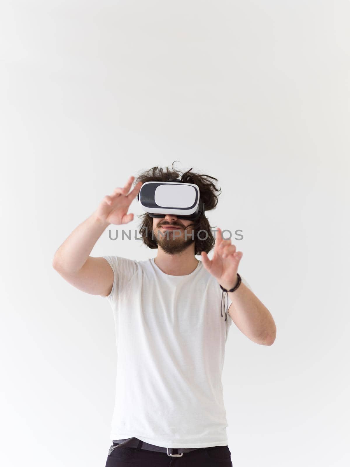 Man using headset of virtual reality by dotshock