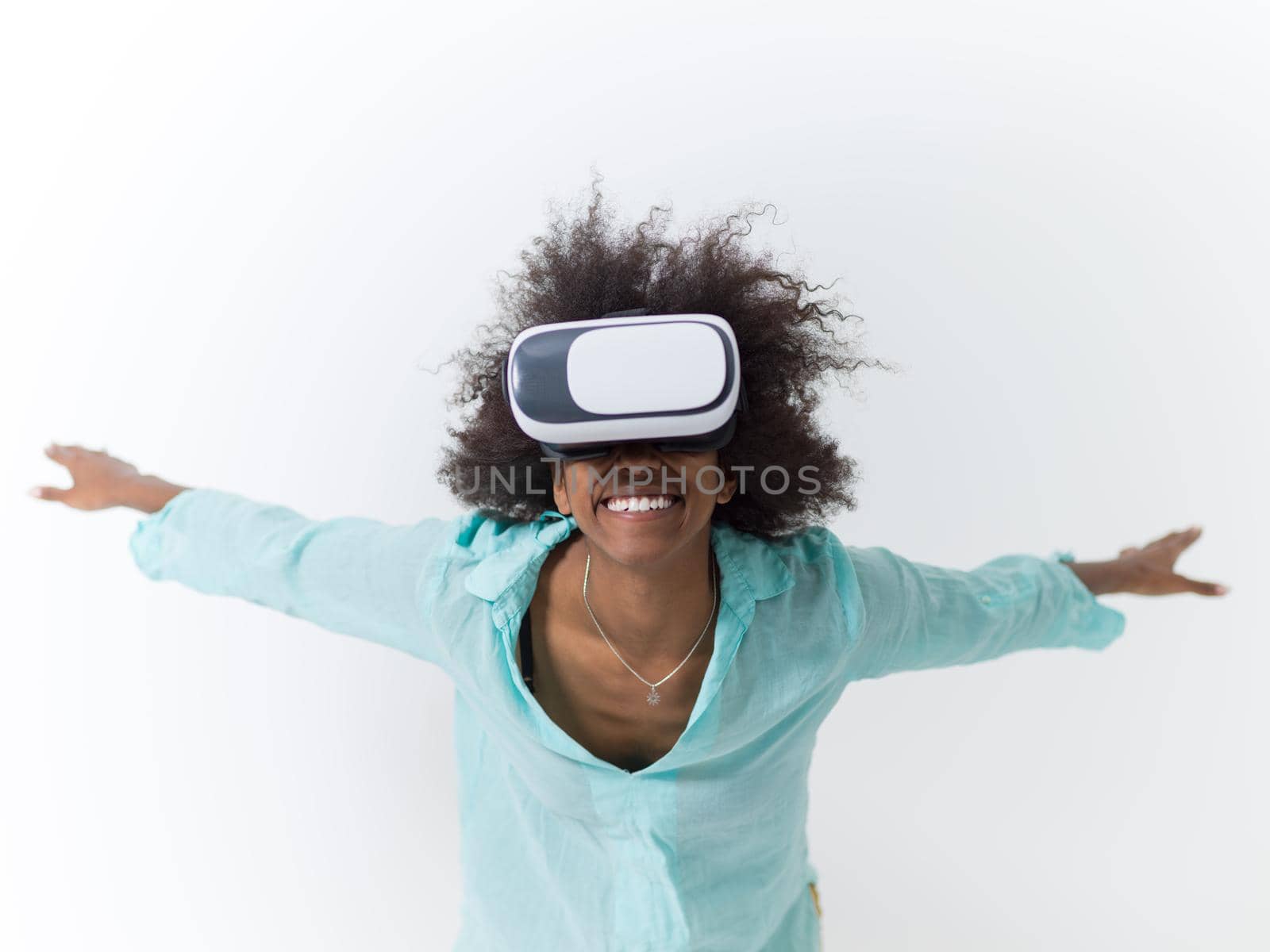 black girl using VR headset glasses of virtual reality by dotshock