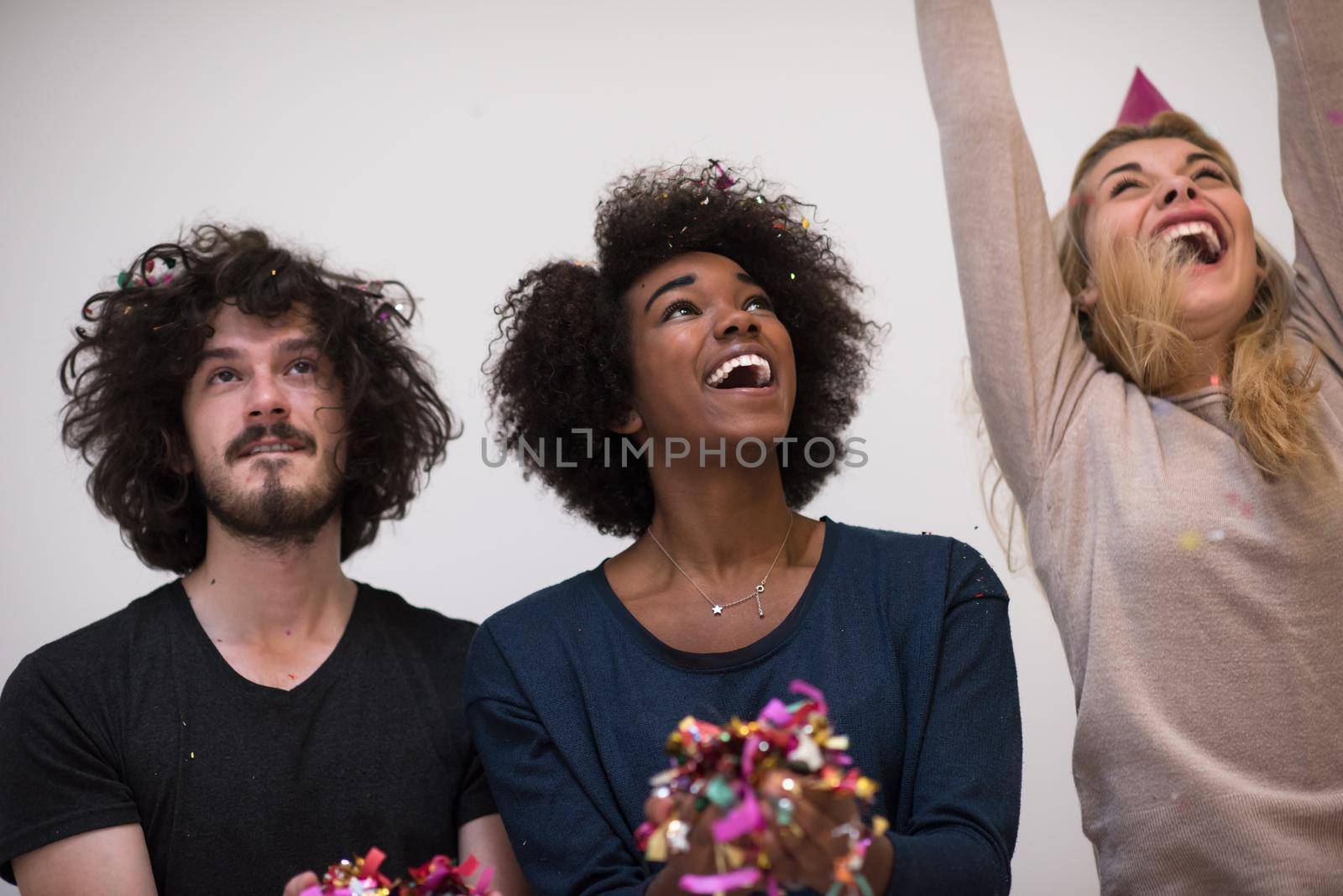 confetti party multiethnic group of people by dotshock