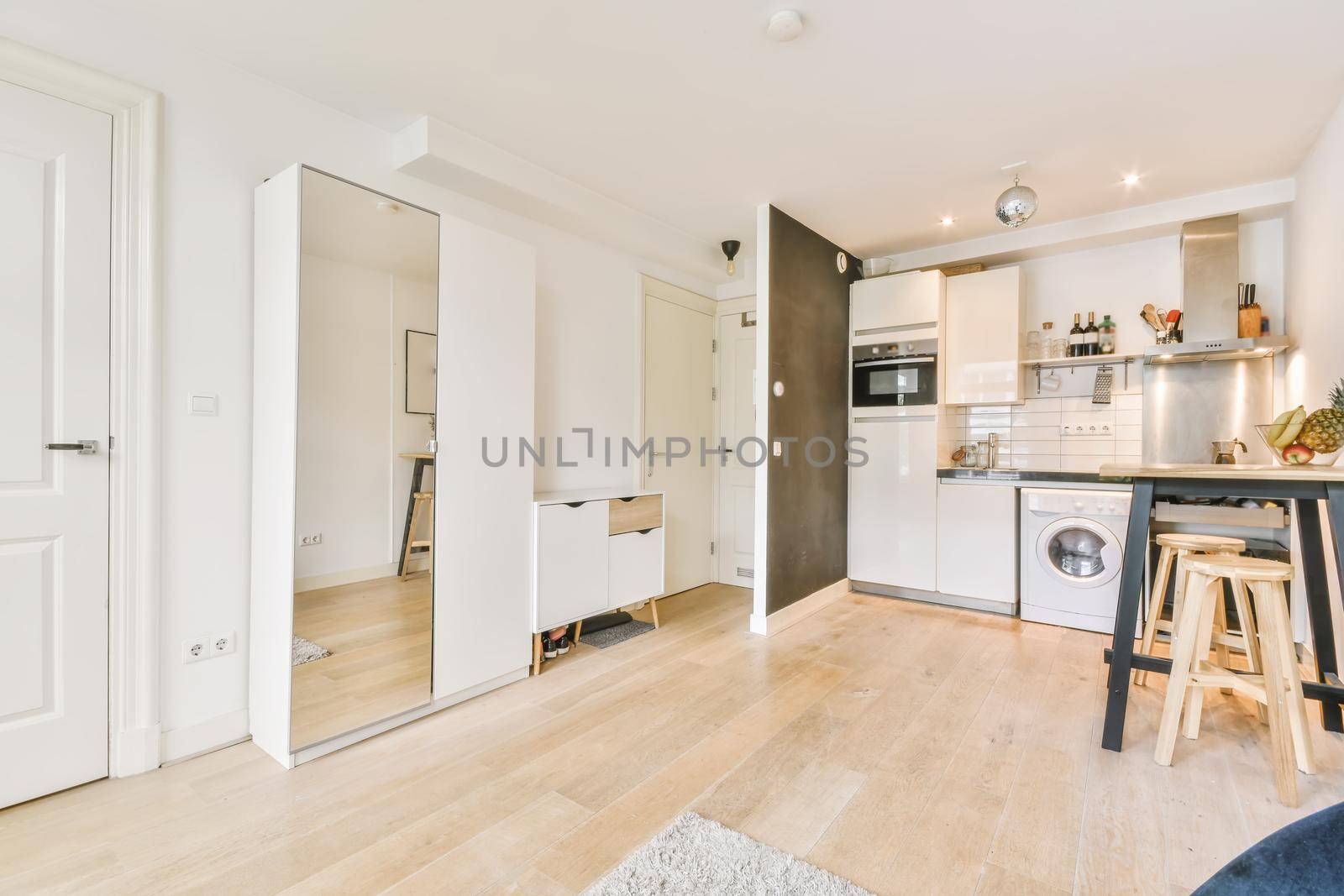 Attractive interior design of studio in luxury building