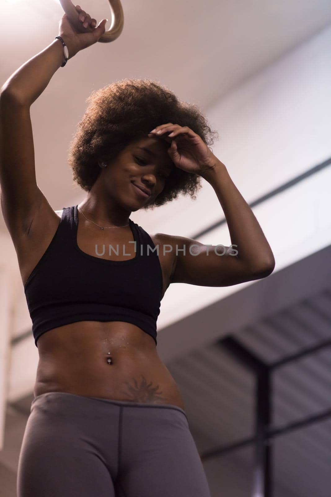 black woman doing dipping exercise by dotshock