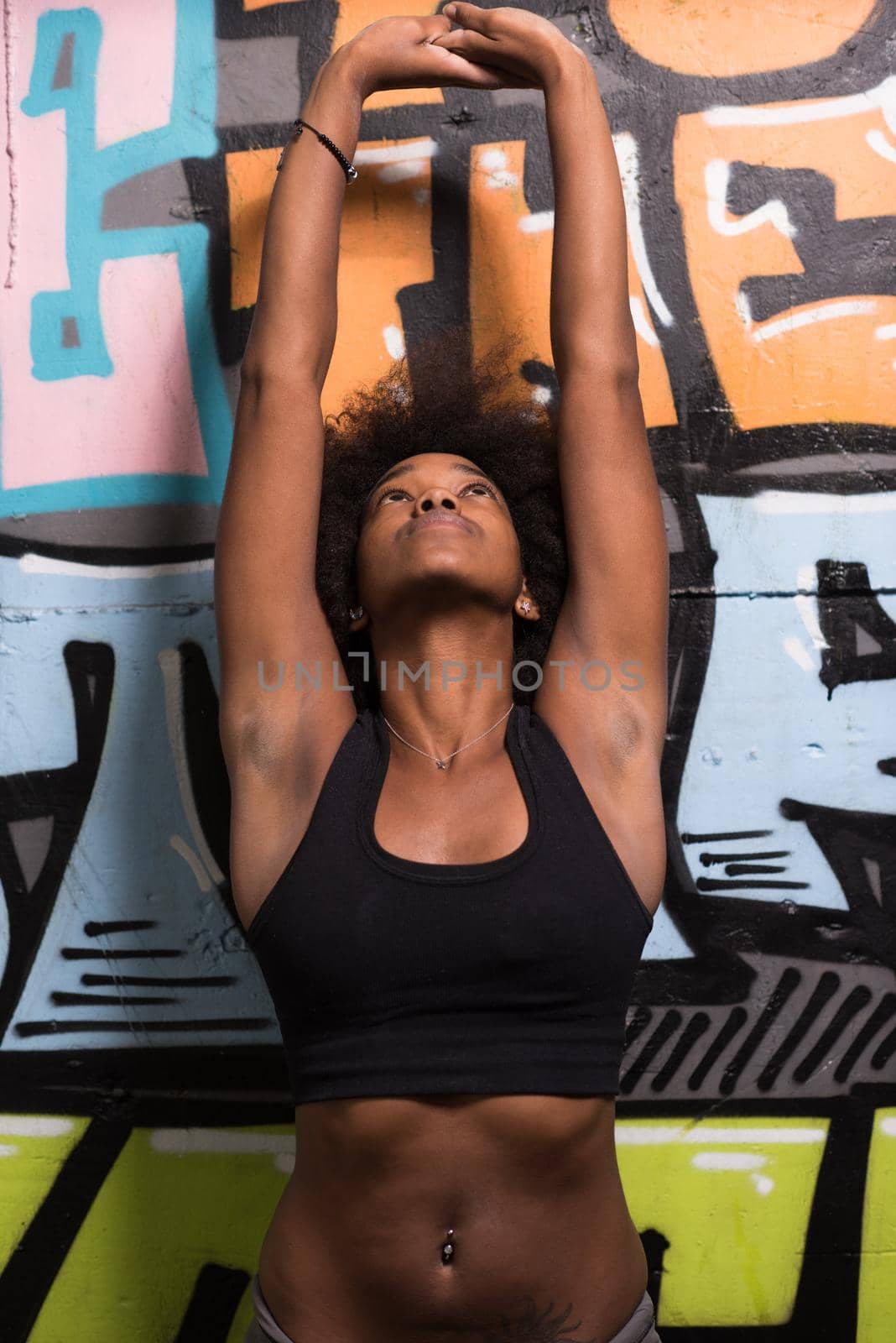 black woman after a workout at the gym by dotshock