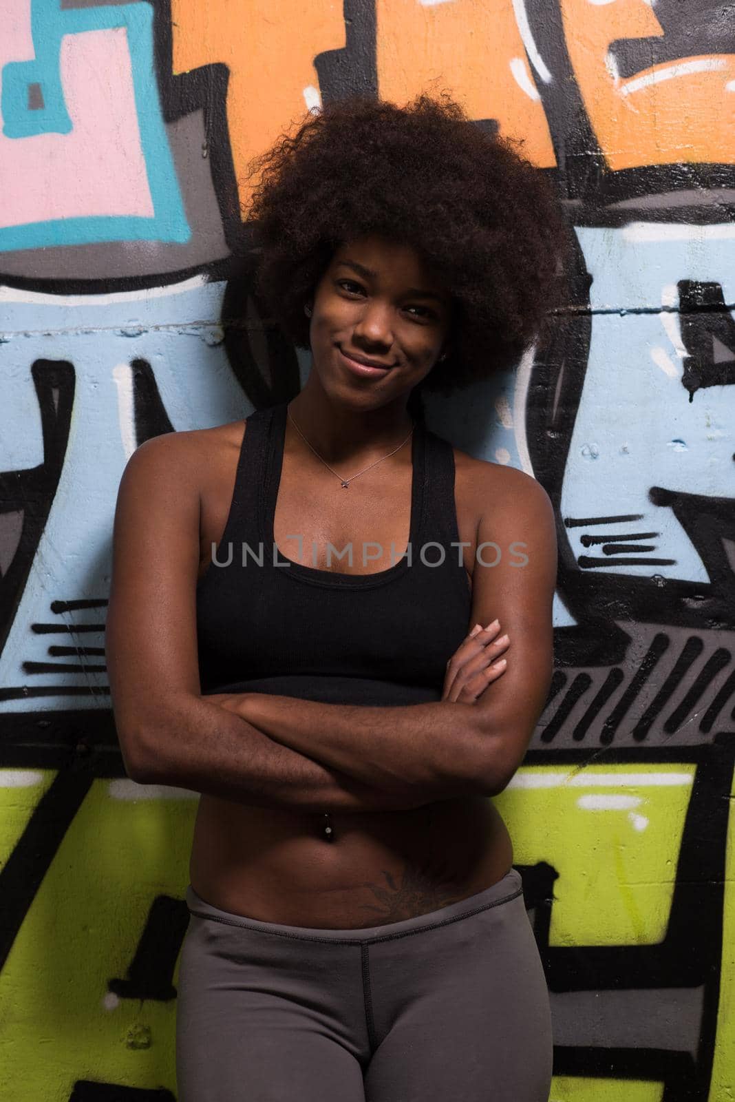 black woman after a workout at the gym by dotshock