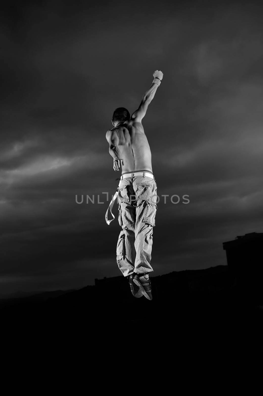 young man dancing and jumping   by dotshock