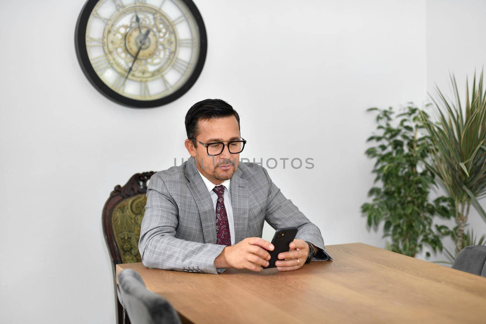 Mature man with glasses at work