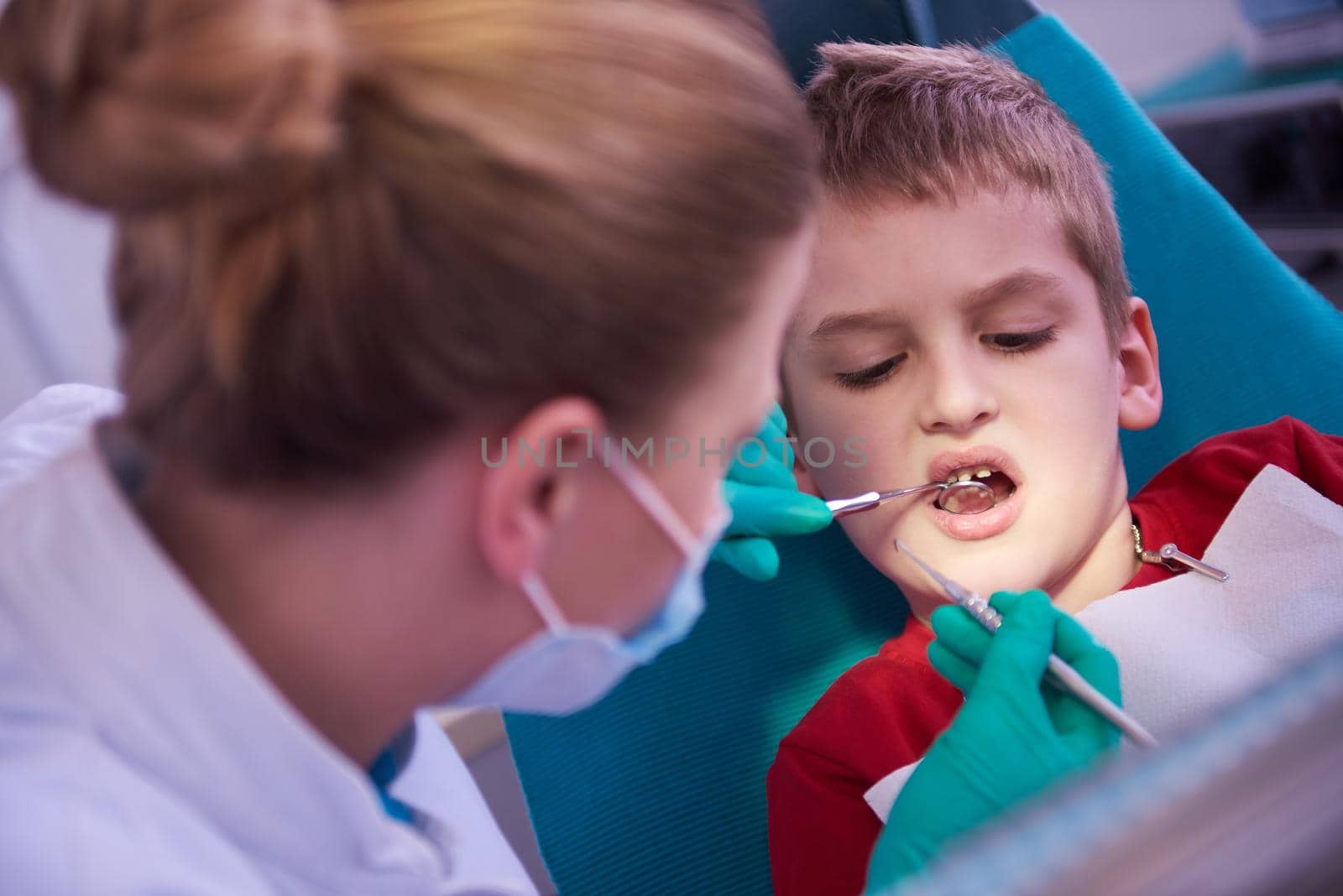 Young boy in a dental surgery by dotshock