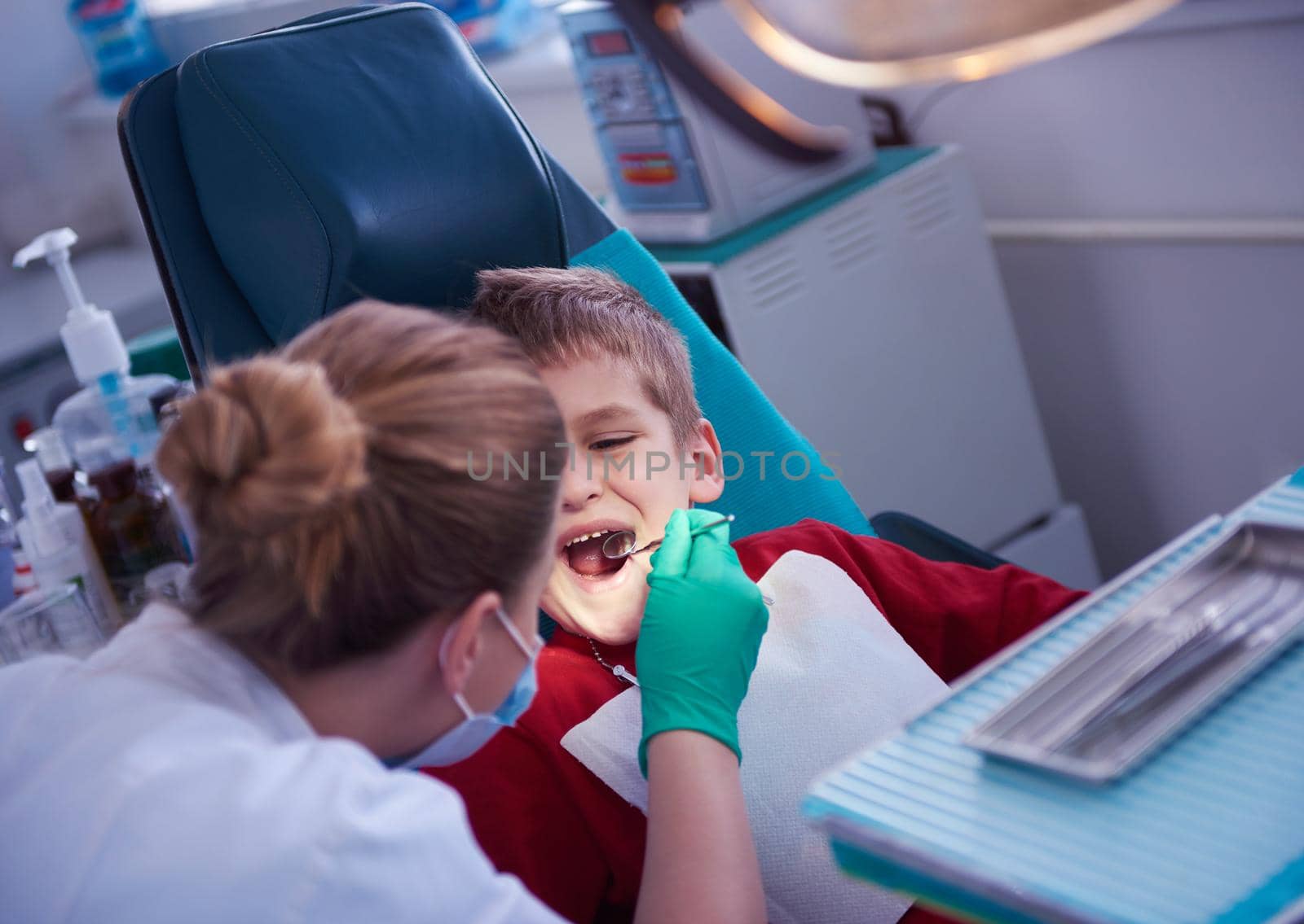 Young boy in a dental surgery by dotshock