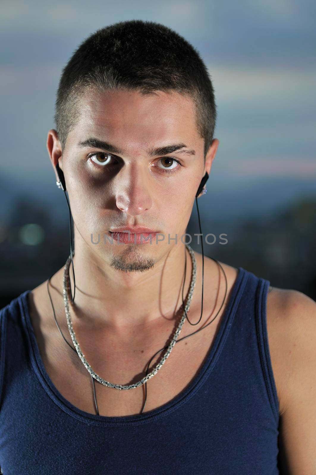 urban style boy portrait looking in camera