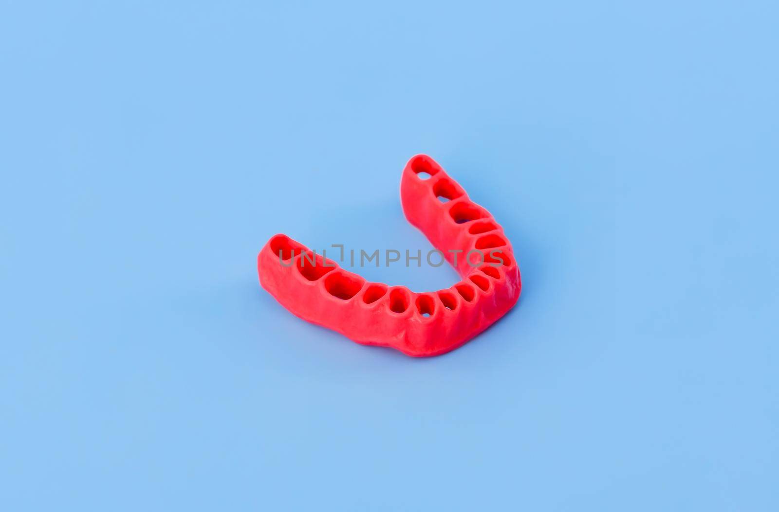 human gums without teeth model medical illustration isolated on blue background. Healthy teeth, dental care and orthodontic concept