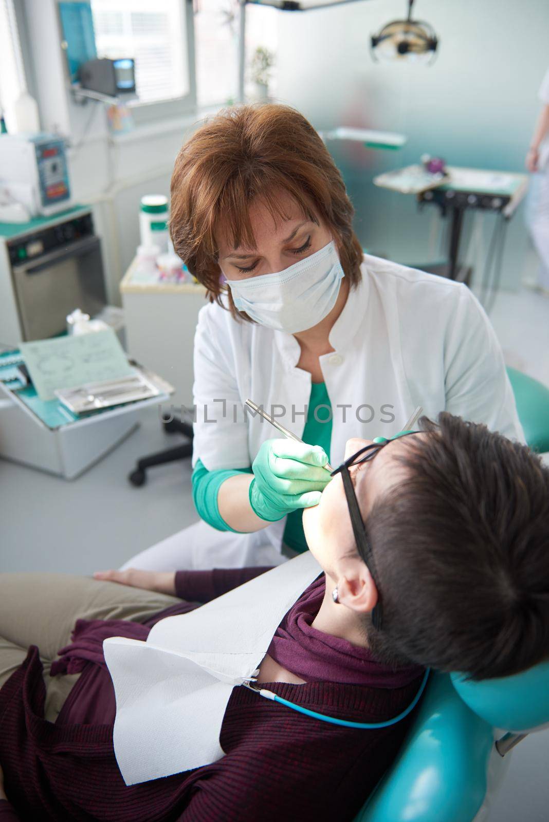 woman patient at the dentist by dotshock