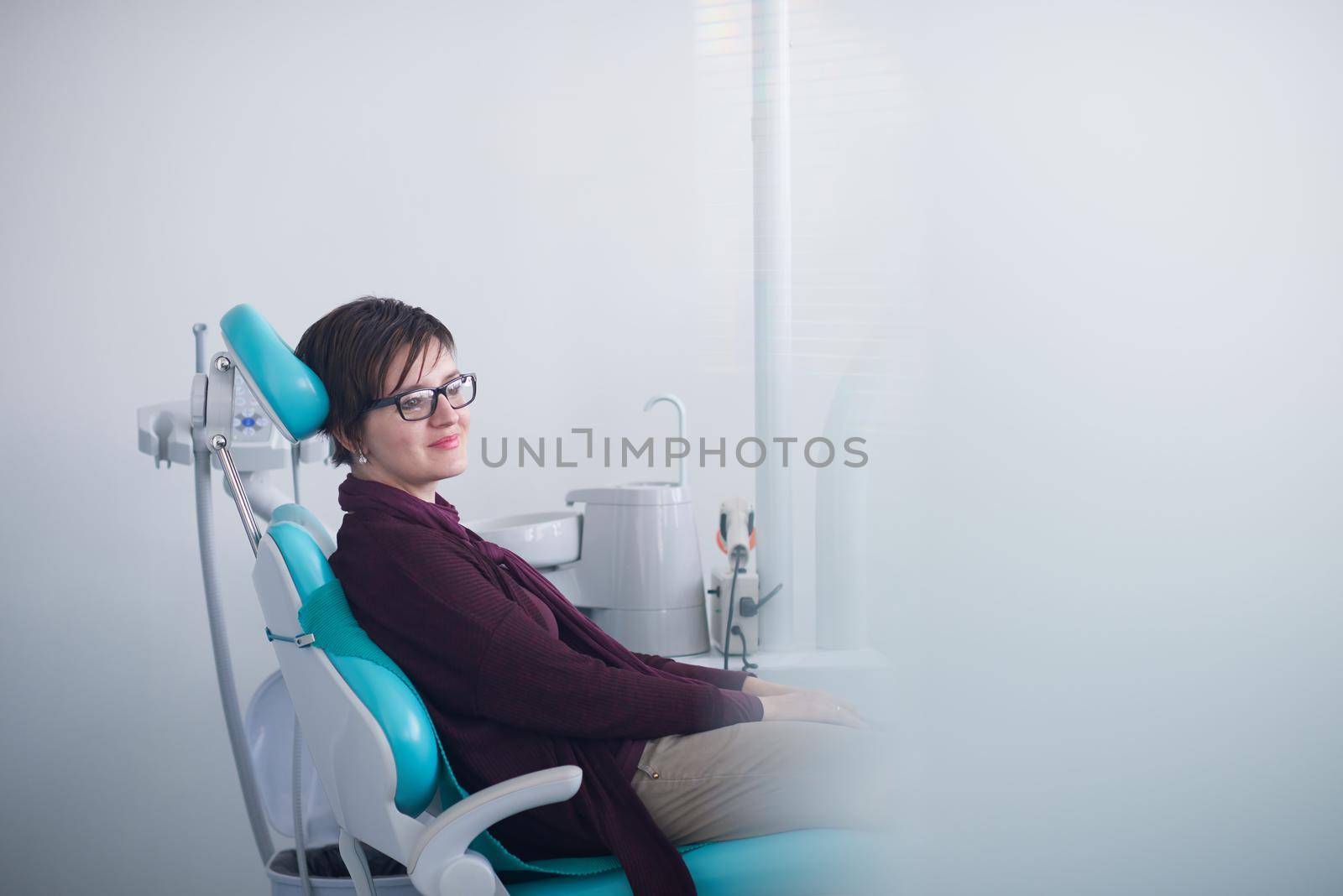 woman patient at the dentist by dotshock