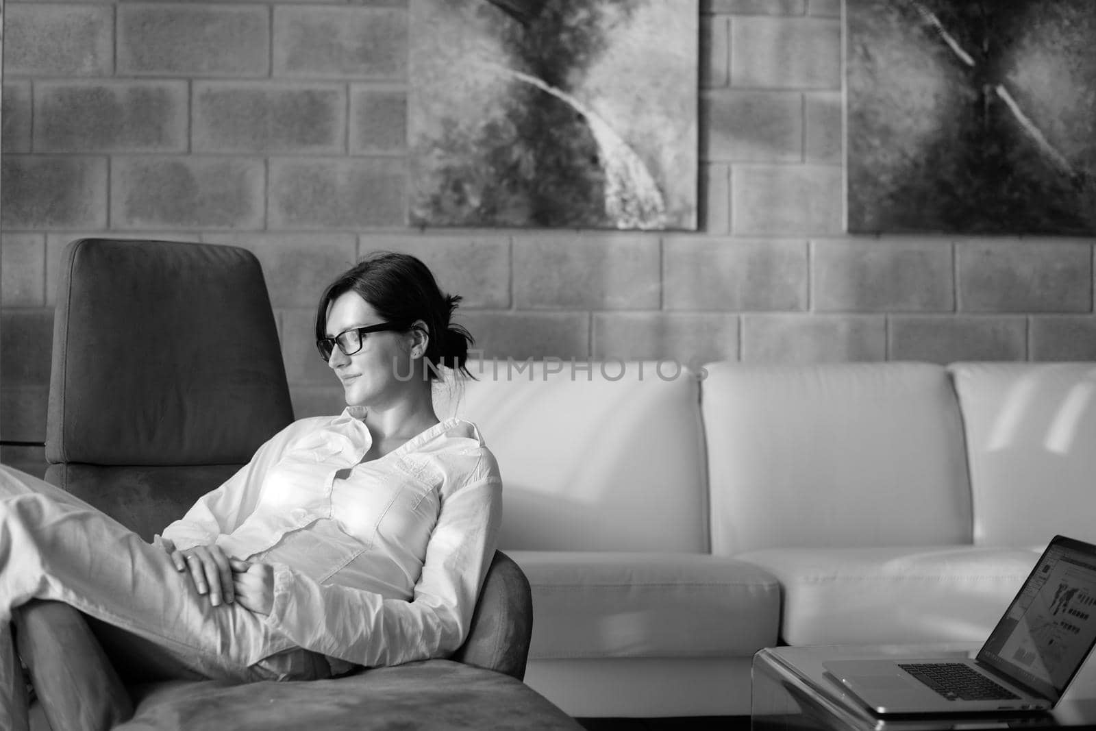 young beautiful woman using a laptop computer at home